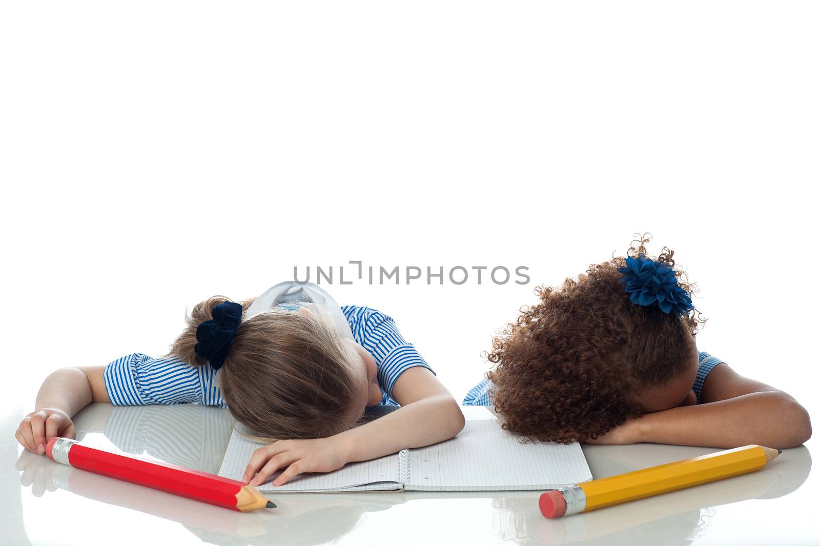 Little girls sleeping in the classroom