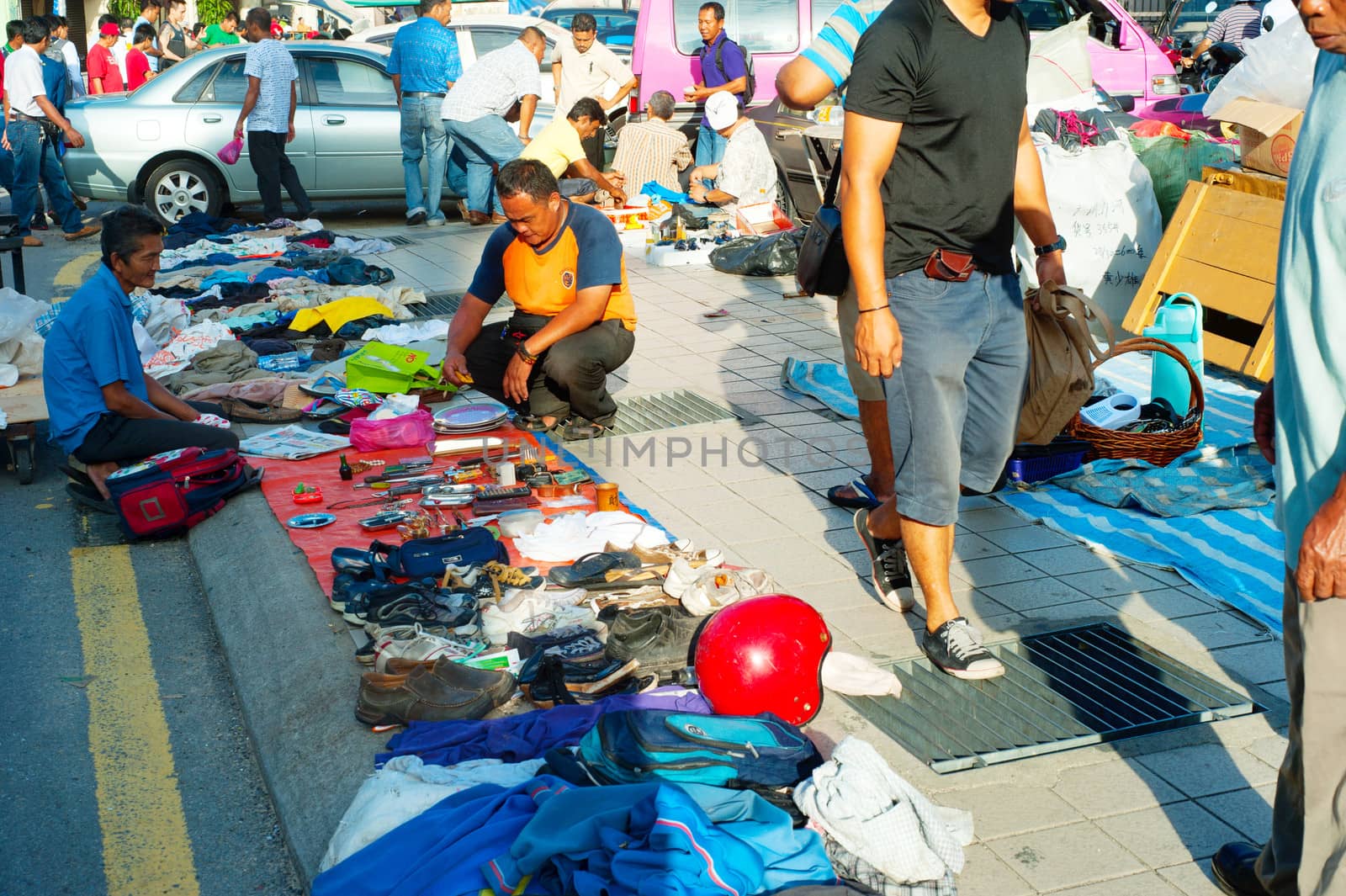 Kuala Lumpur, Malaysia - May 12, 2013: Unidentified people at flee market in Chinatown in Kuala Lumpur. About 44%, of Kuala Lumpur population are the Chinese.