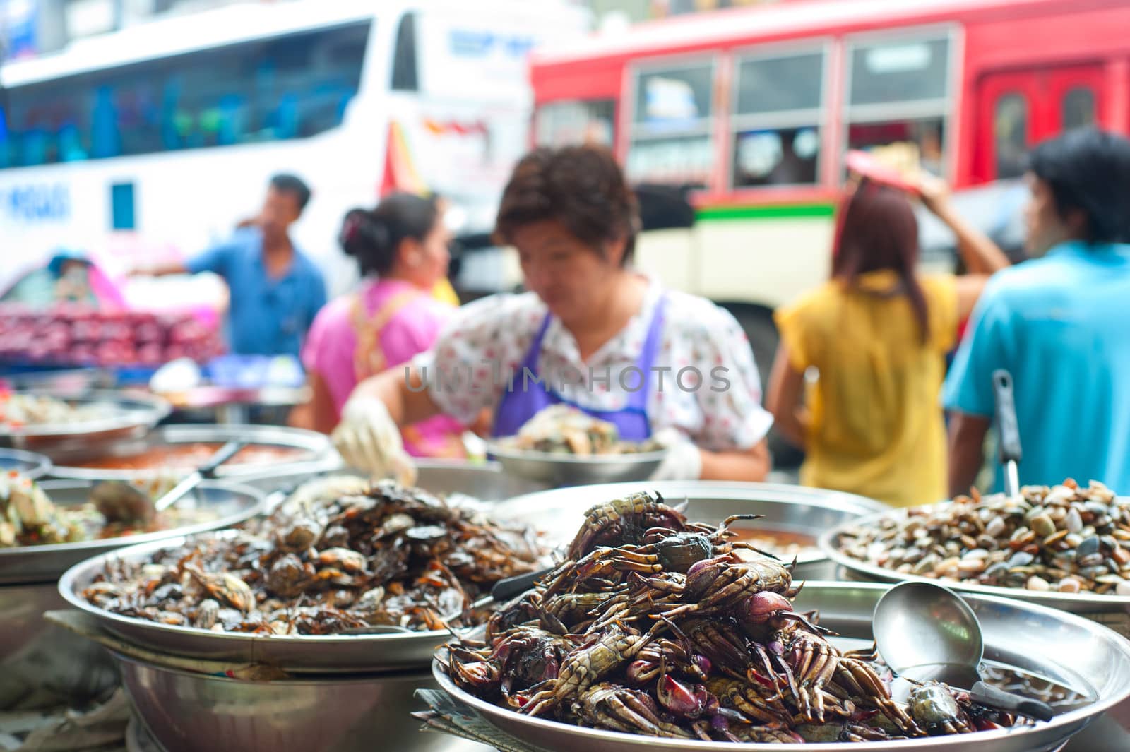Bangkok, Thailand - March 04, 2013: Food stall on the street in Bangkok, Thailand. According gov stats there are over 16,000 registered street vendors in Bangkok.
