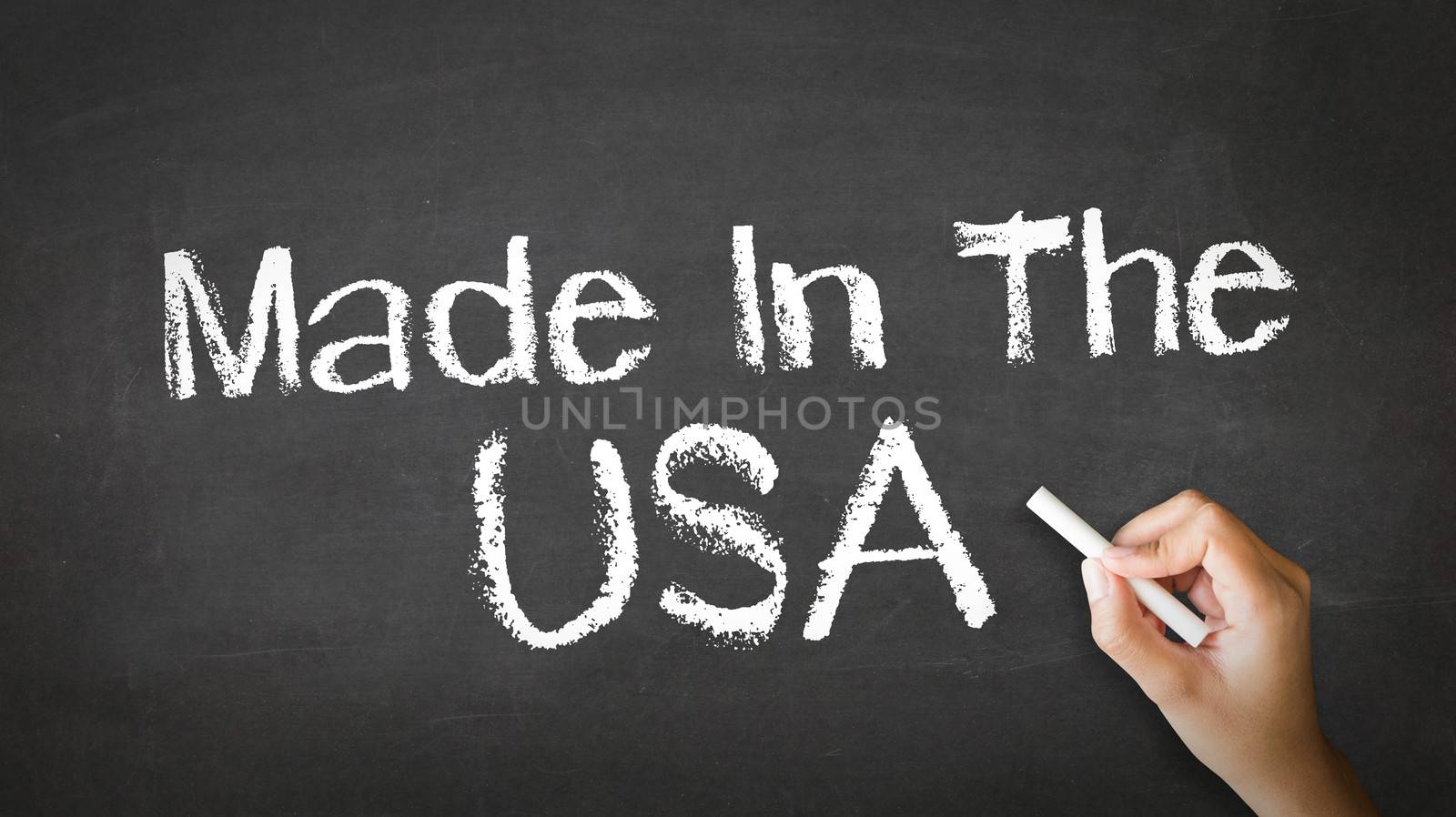 A person drawing and pointing at a Made in USA Chalk Illustration