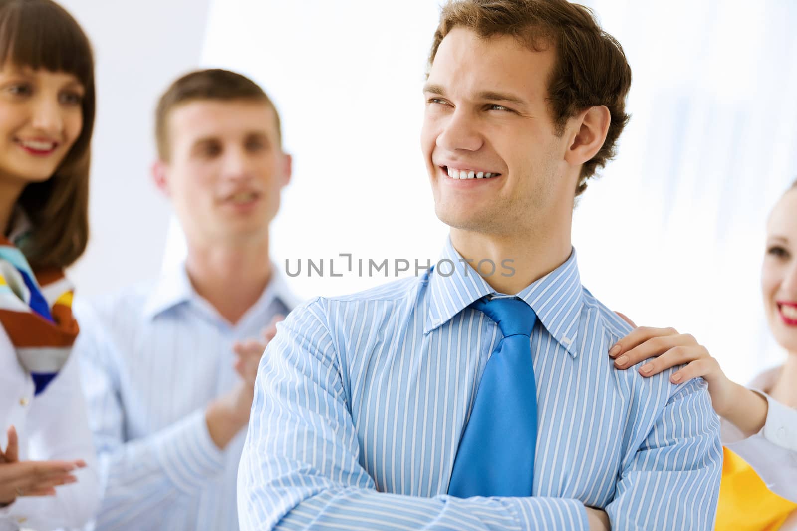 Image of successful young happy business persons