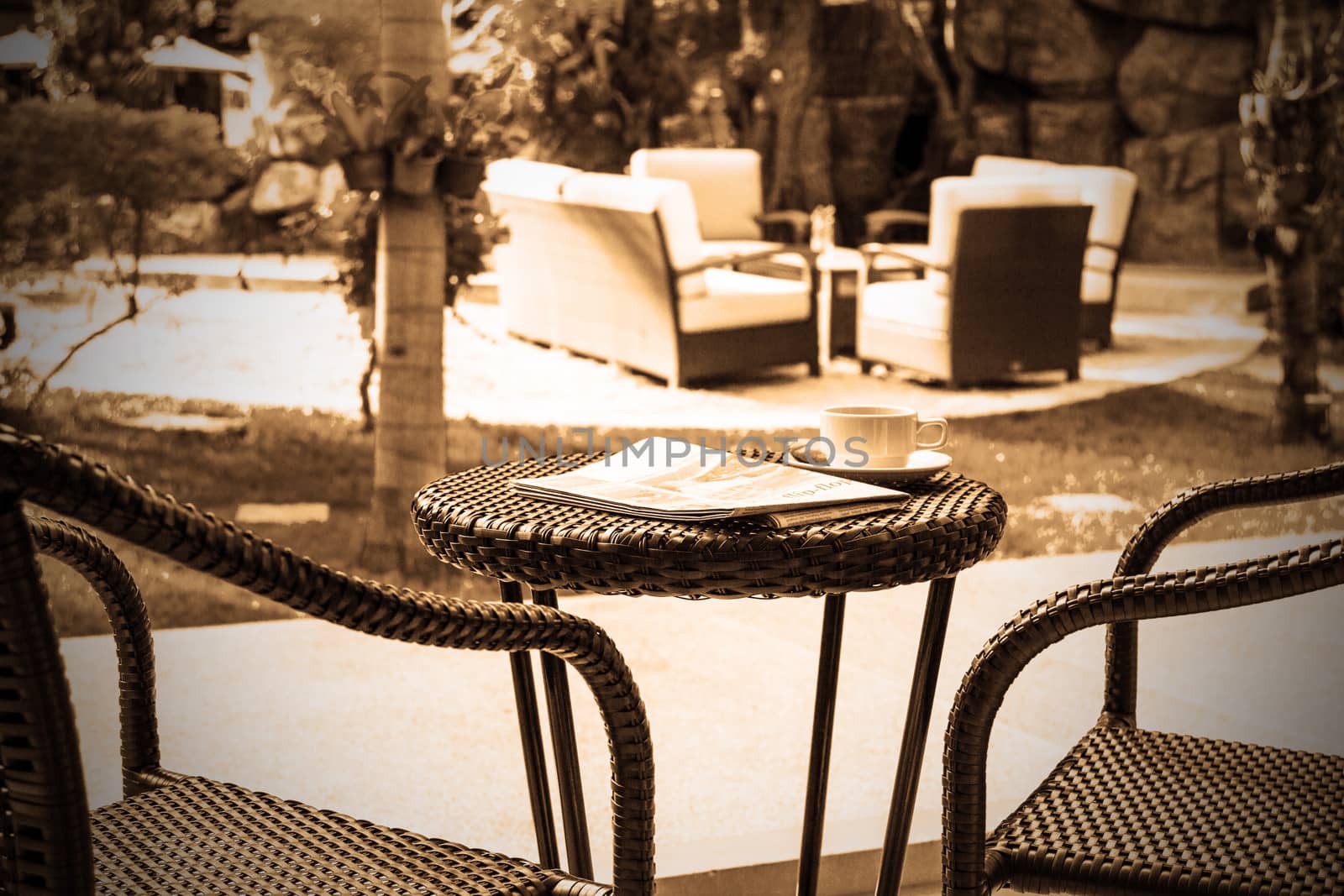 Coffee and newspaper on table for relax