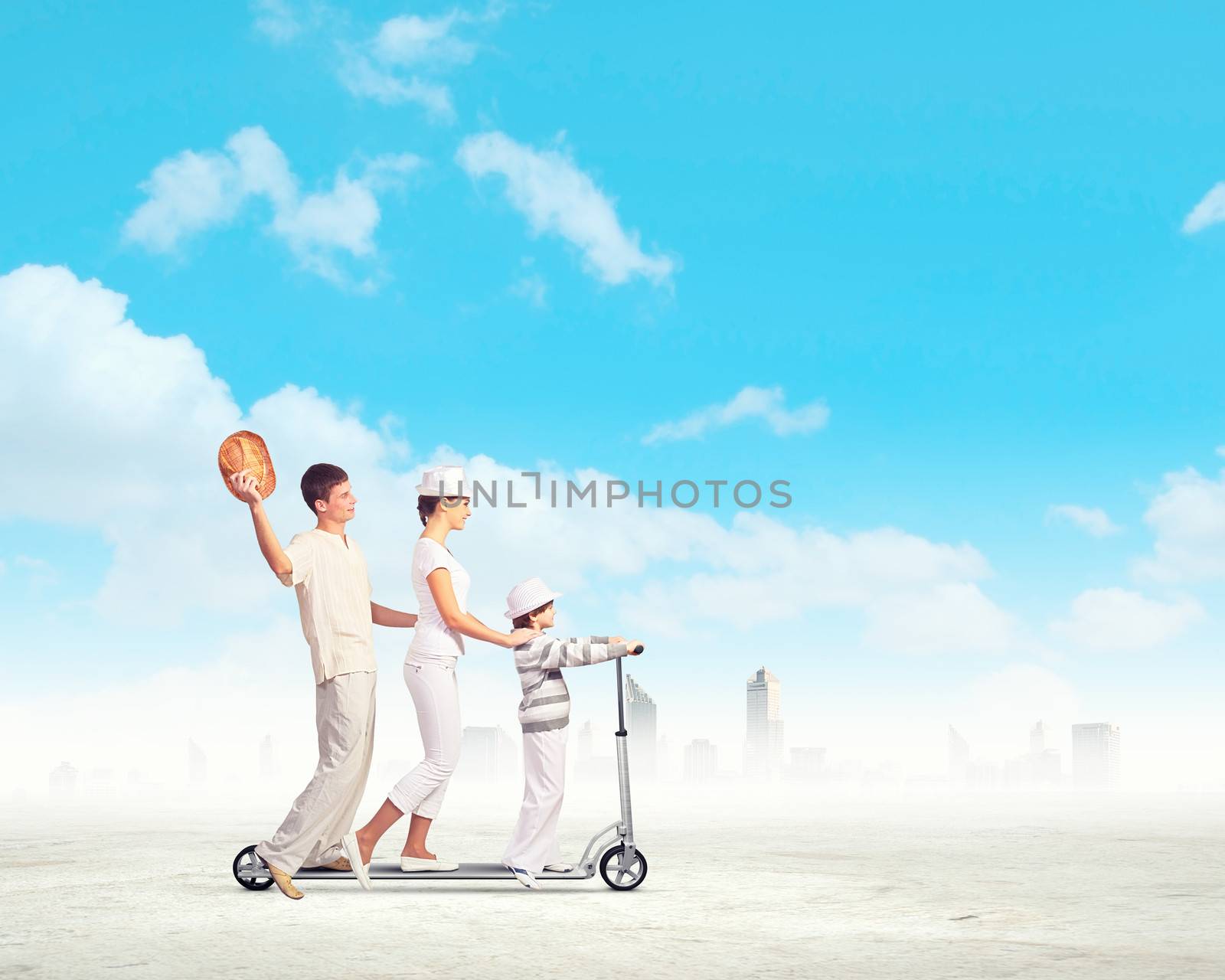 Image of happy young family riding on scooter