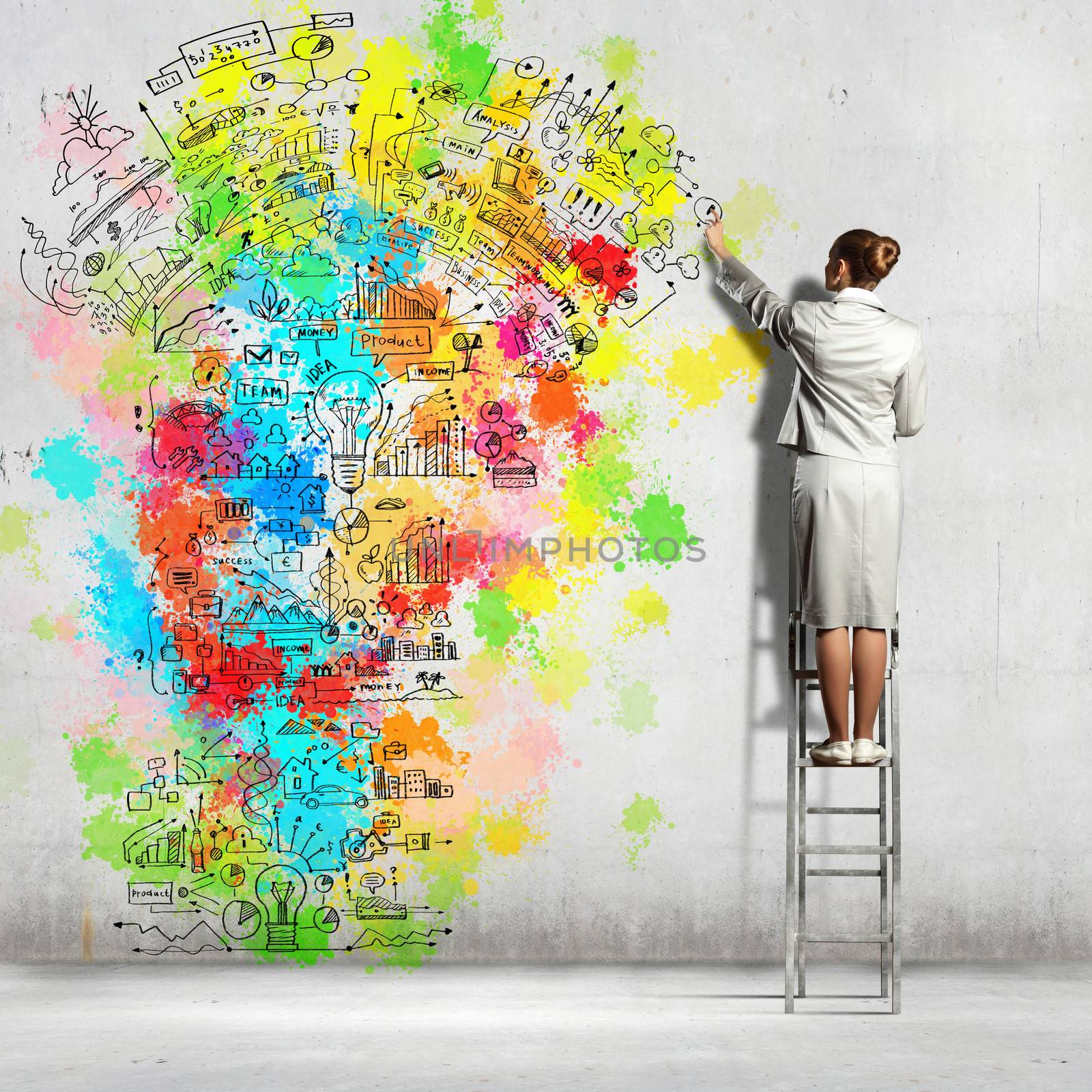 Back view of businesswoman drawing colorful business ideas on wall