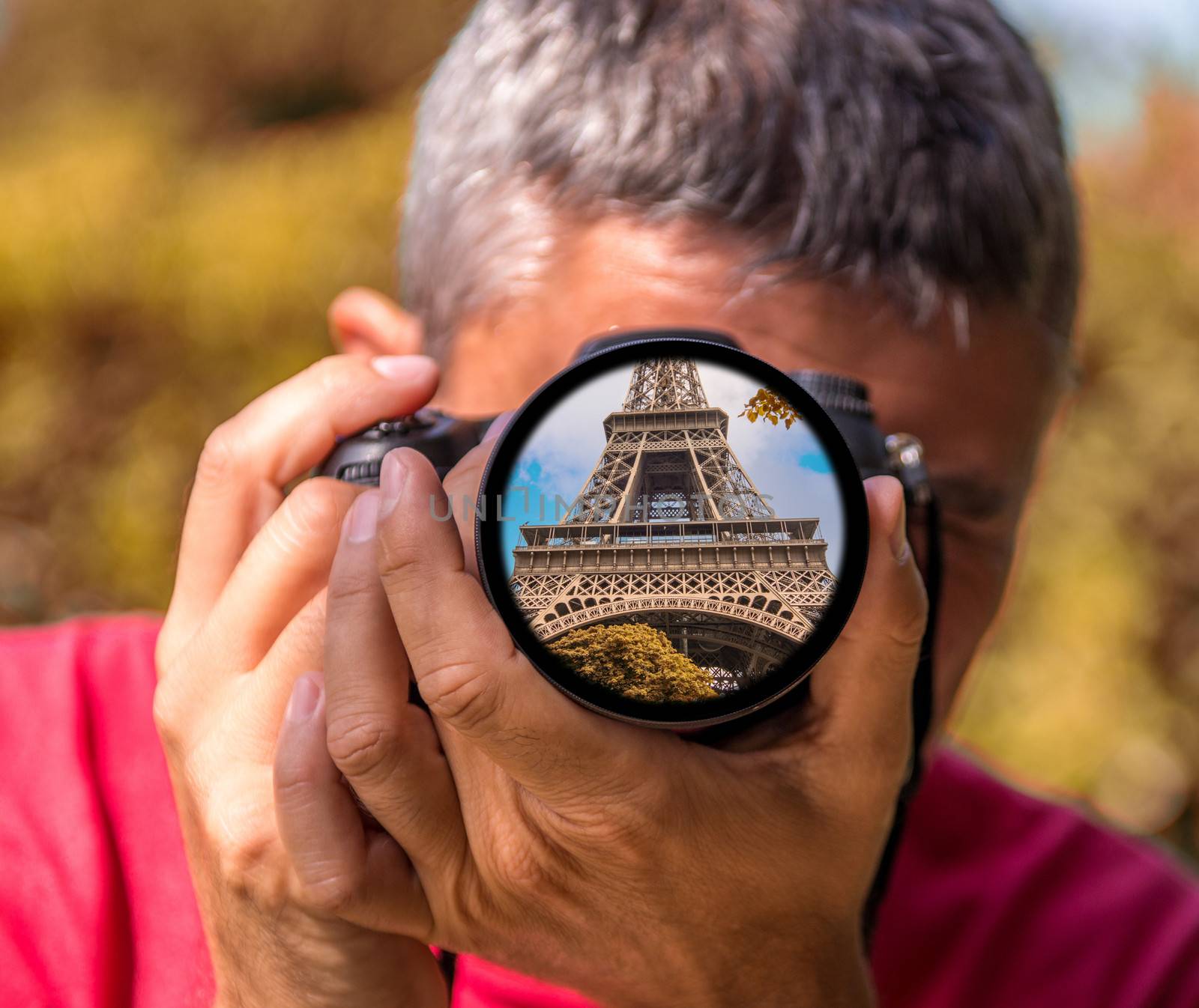 Tourist capturing a shot of Eiffel Tower, Paris.