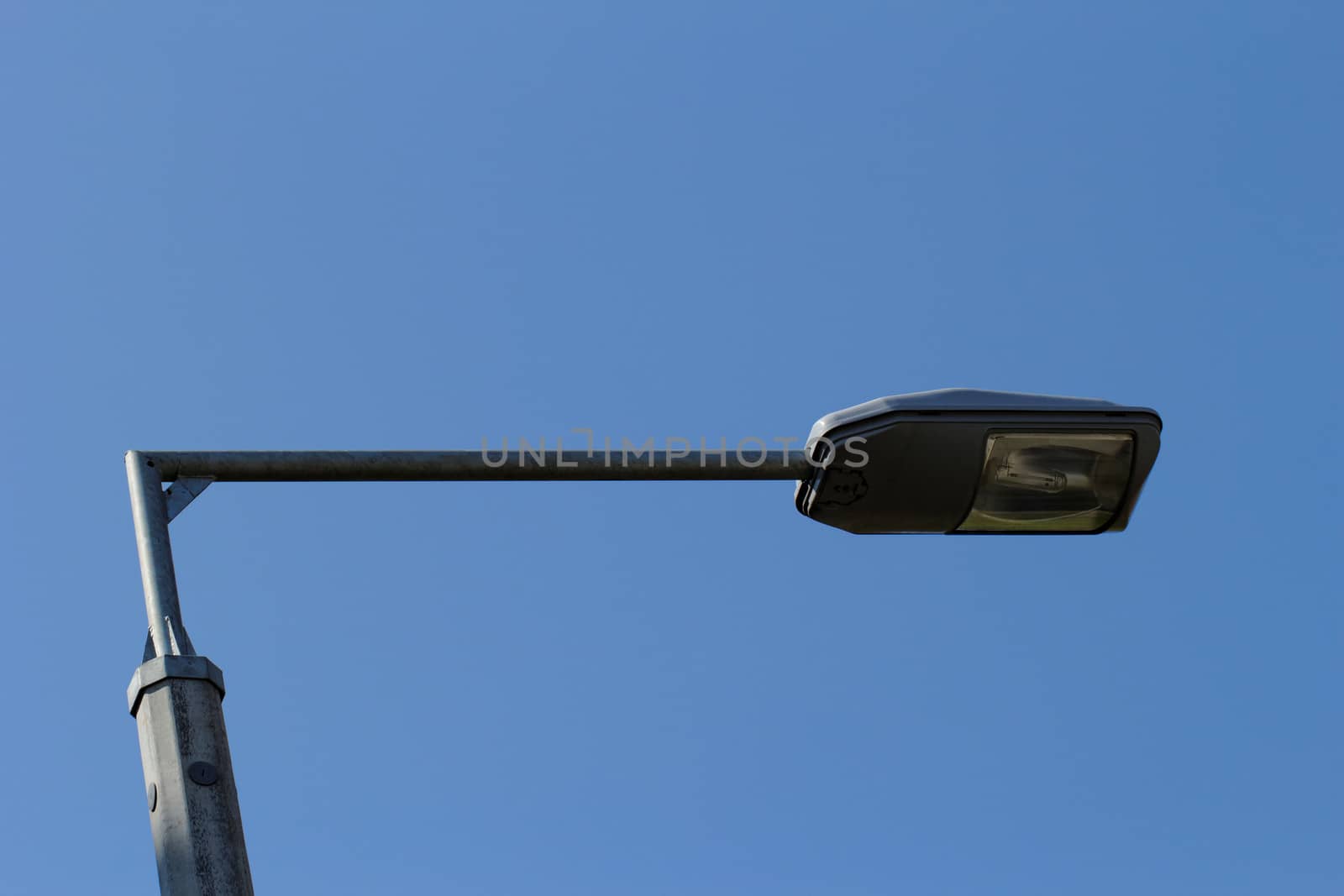 Street lamp under the blue sky