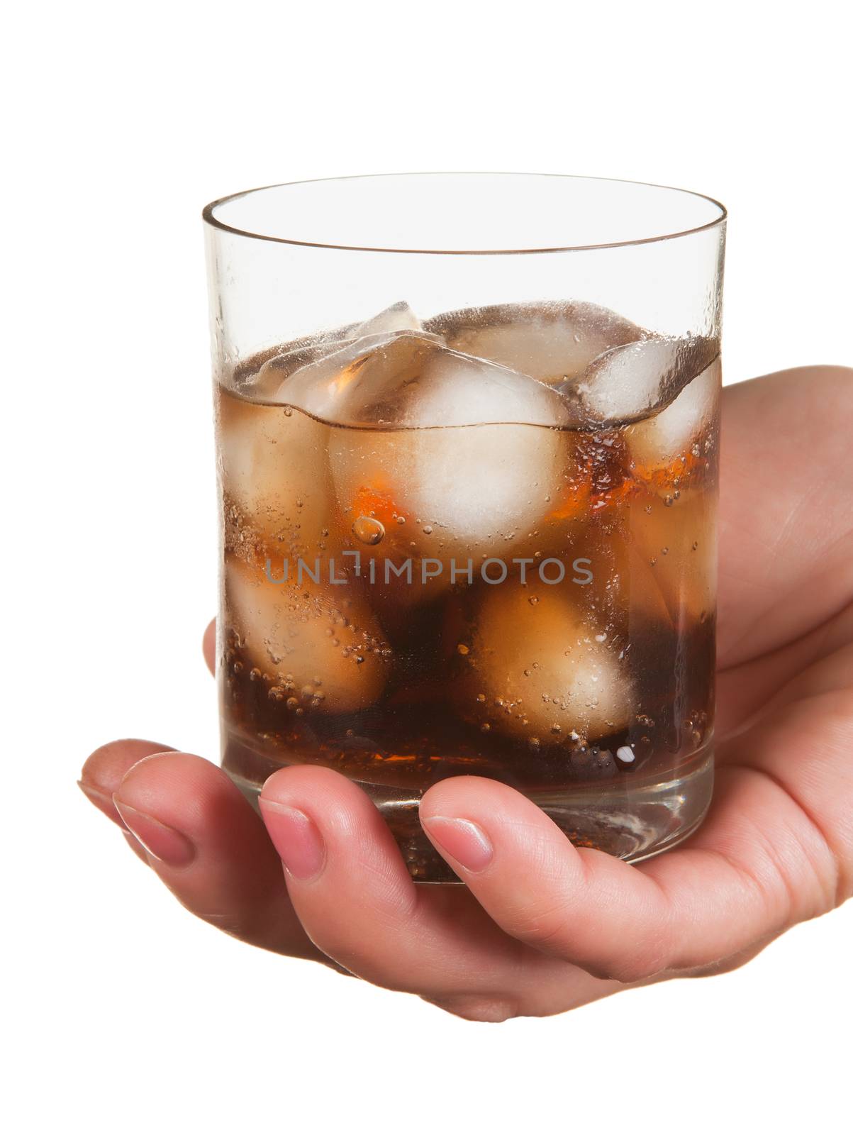 Carbonated water with ice in a glass isolated on white background