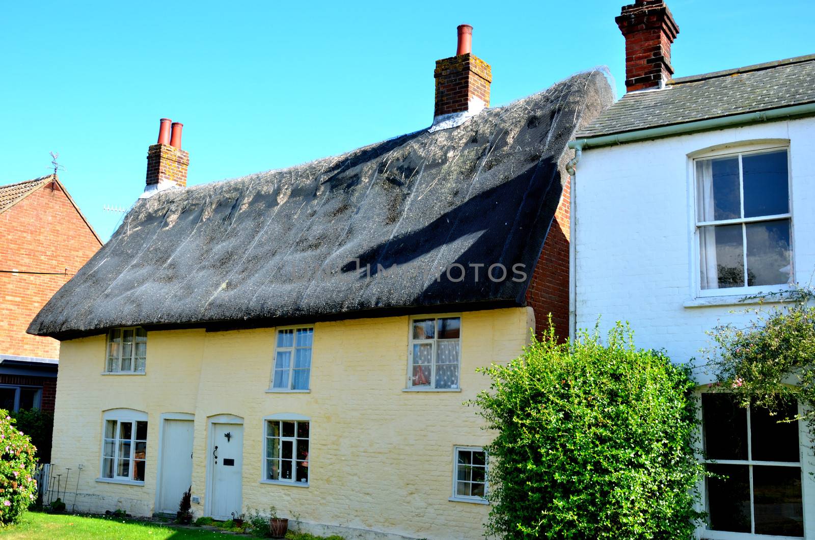 Pale yellow english cottage