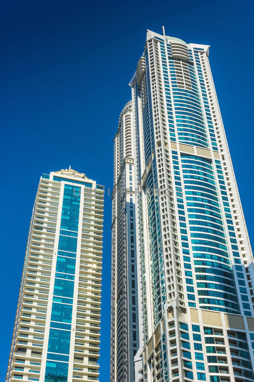 DUBAI, UAE - NOVEMBER 13: High rise buildings and streets nov 13. 2012  in Dubai, UAE. Dubai was the fastest developing city in the world between 2002 and 2008.