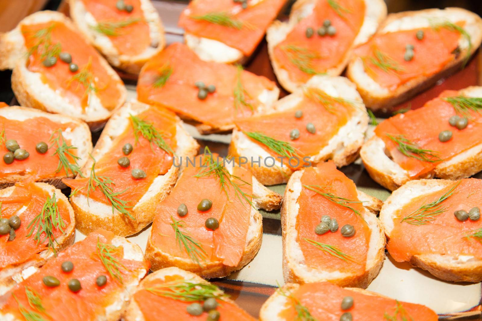 The crunchy Crostini combine with the smoky salmon, salty capers and fresh dill to make these beautiful appetizers a party favorite.