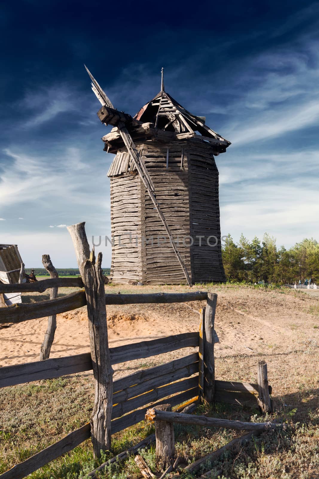 old destroyed wooden windmill, Russia