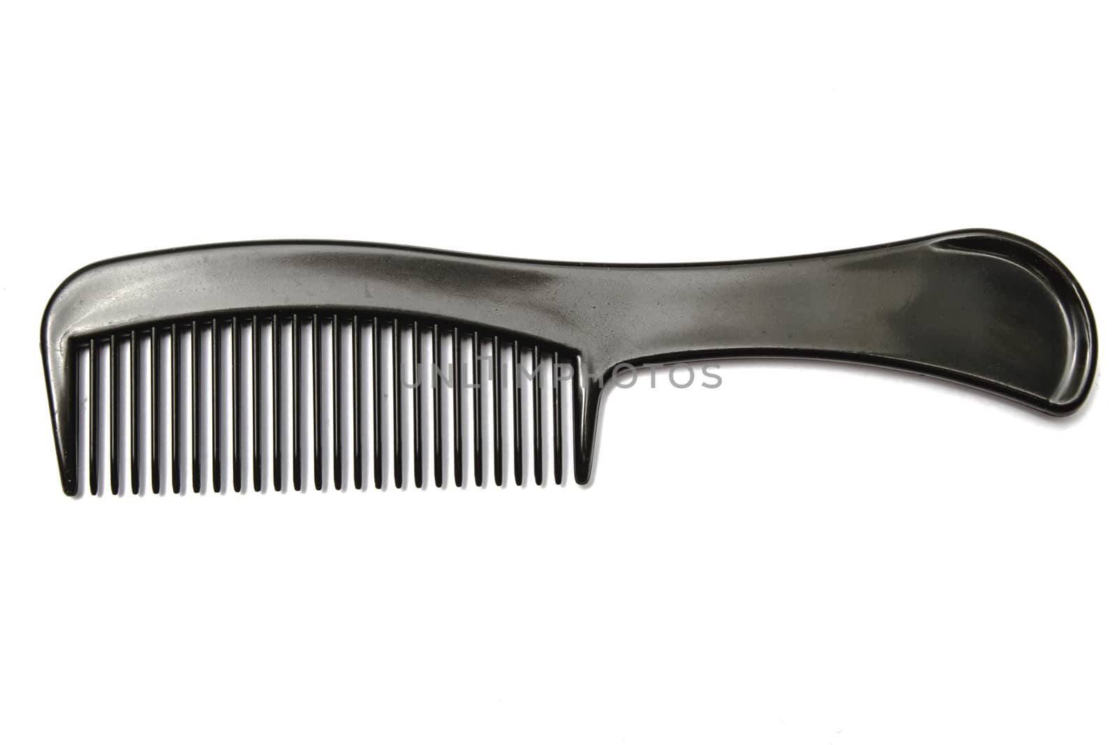 Black comb isolated on white background 