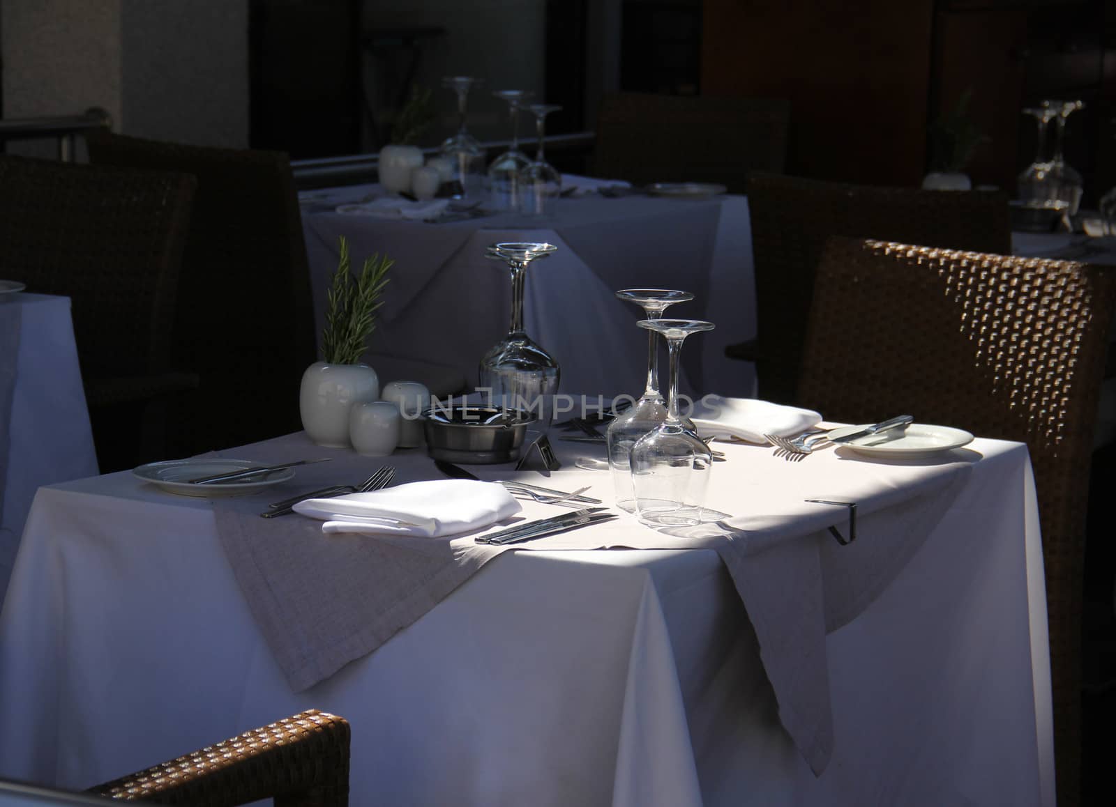 Terrace restaurant table waiting for guests by anterovium