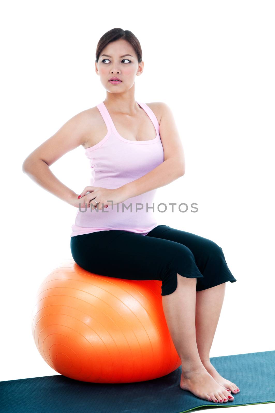 Pretty Woman Sitting On Fitness Ball by williv