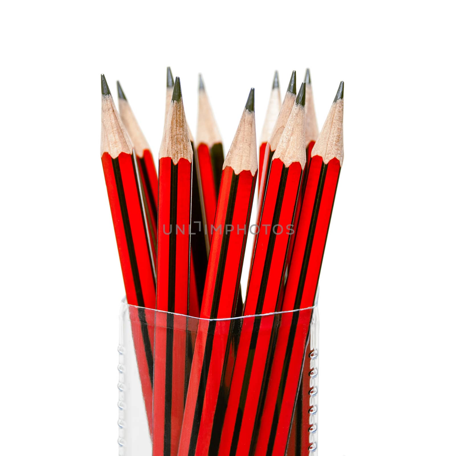 Black and white pencils in red on a white isolated background.
