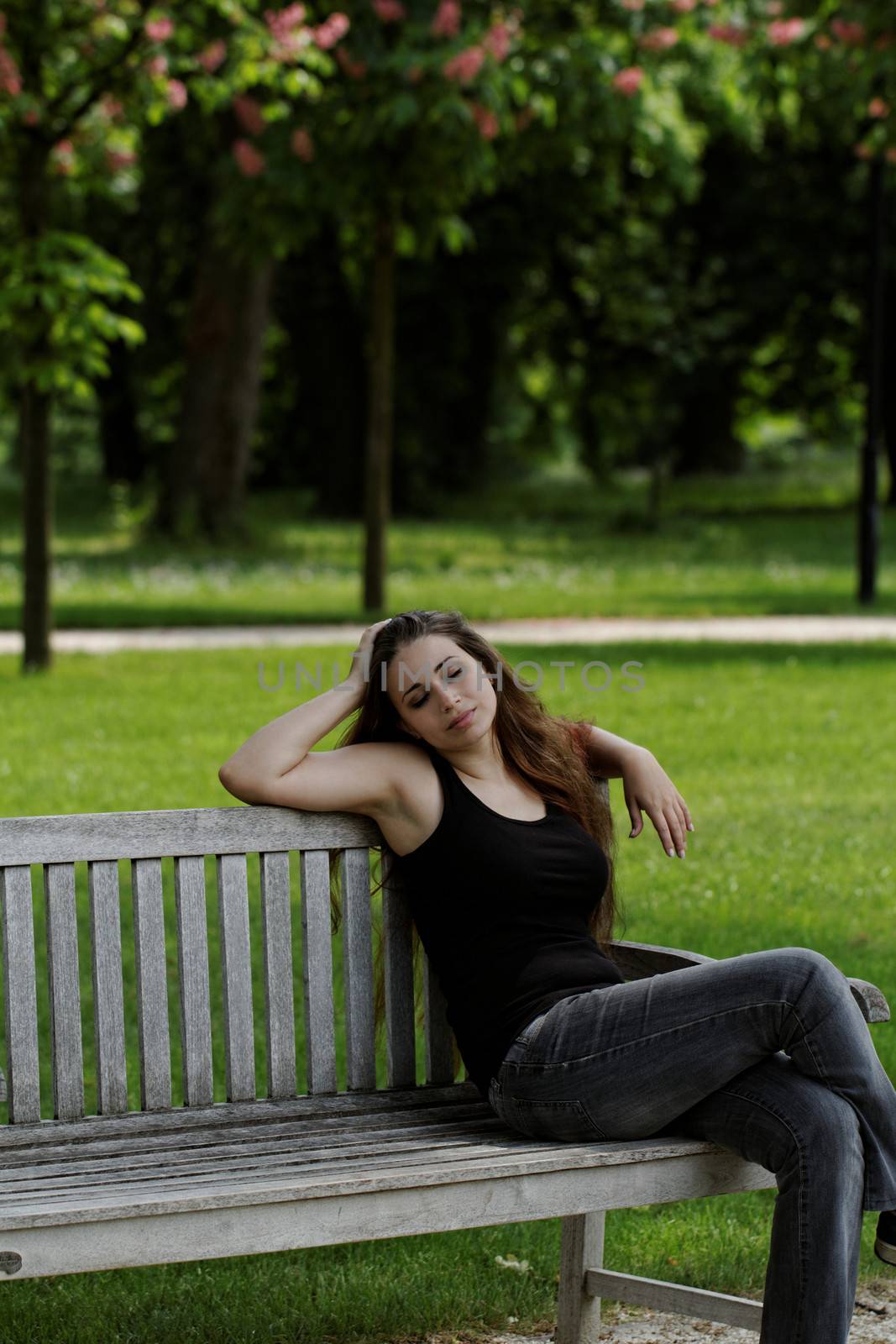 pretty young girl on a bench by NagyDodo