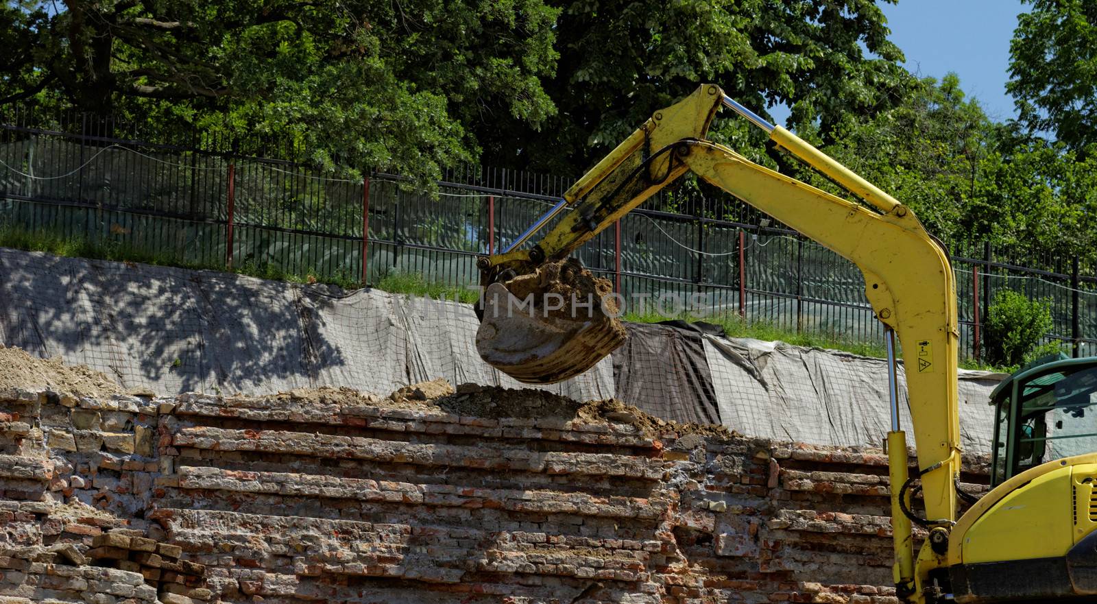 the excavator working on a construction site