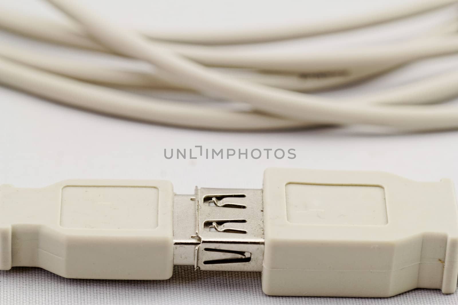 white usb extension cable on white background