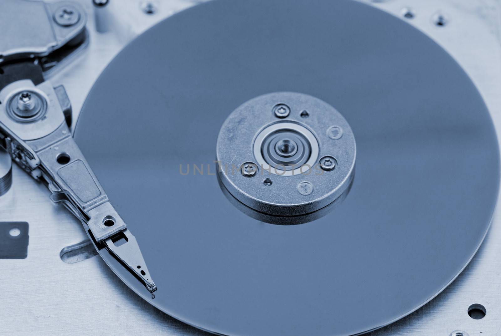 Open computer hard drive on white background by NagyDodo