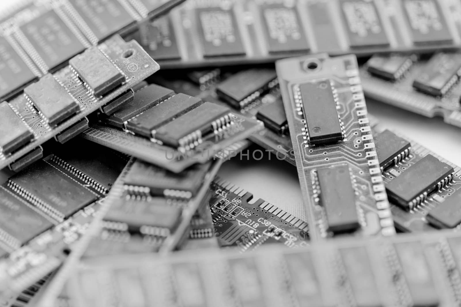 Many different computer memory modules in bw (RAM, SD, DDR, EPROM)