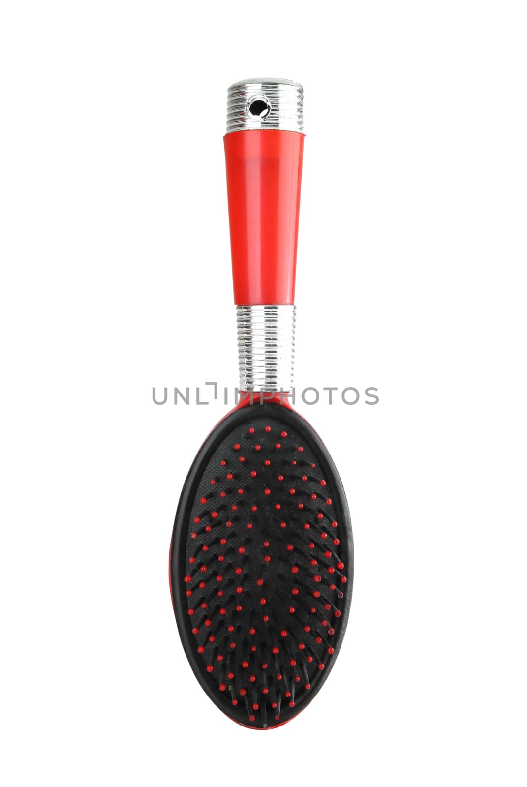 red hairbrush on white background