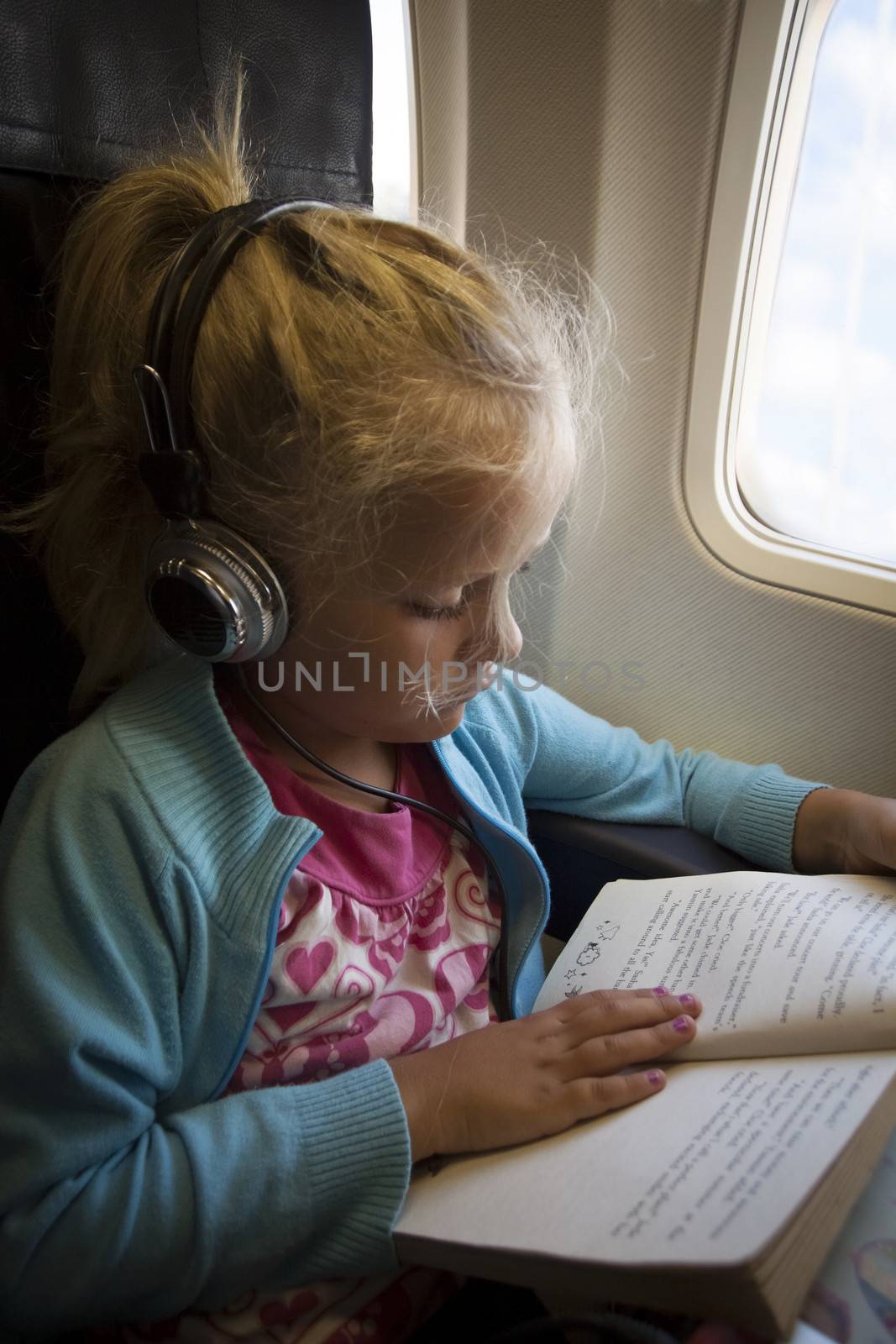 Child in airplane by annems