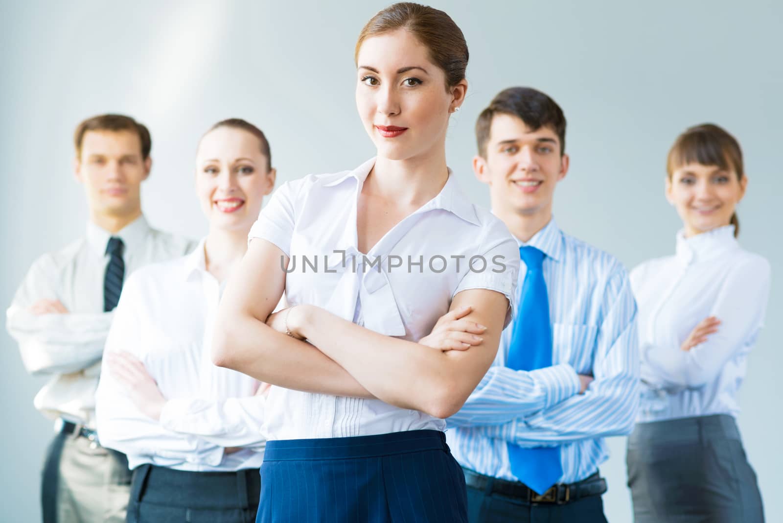 concept of teamwork, business woman crossed her arms over her team