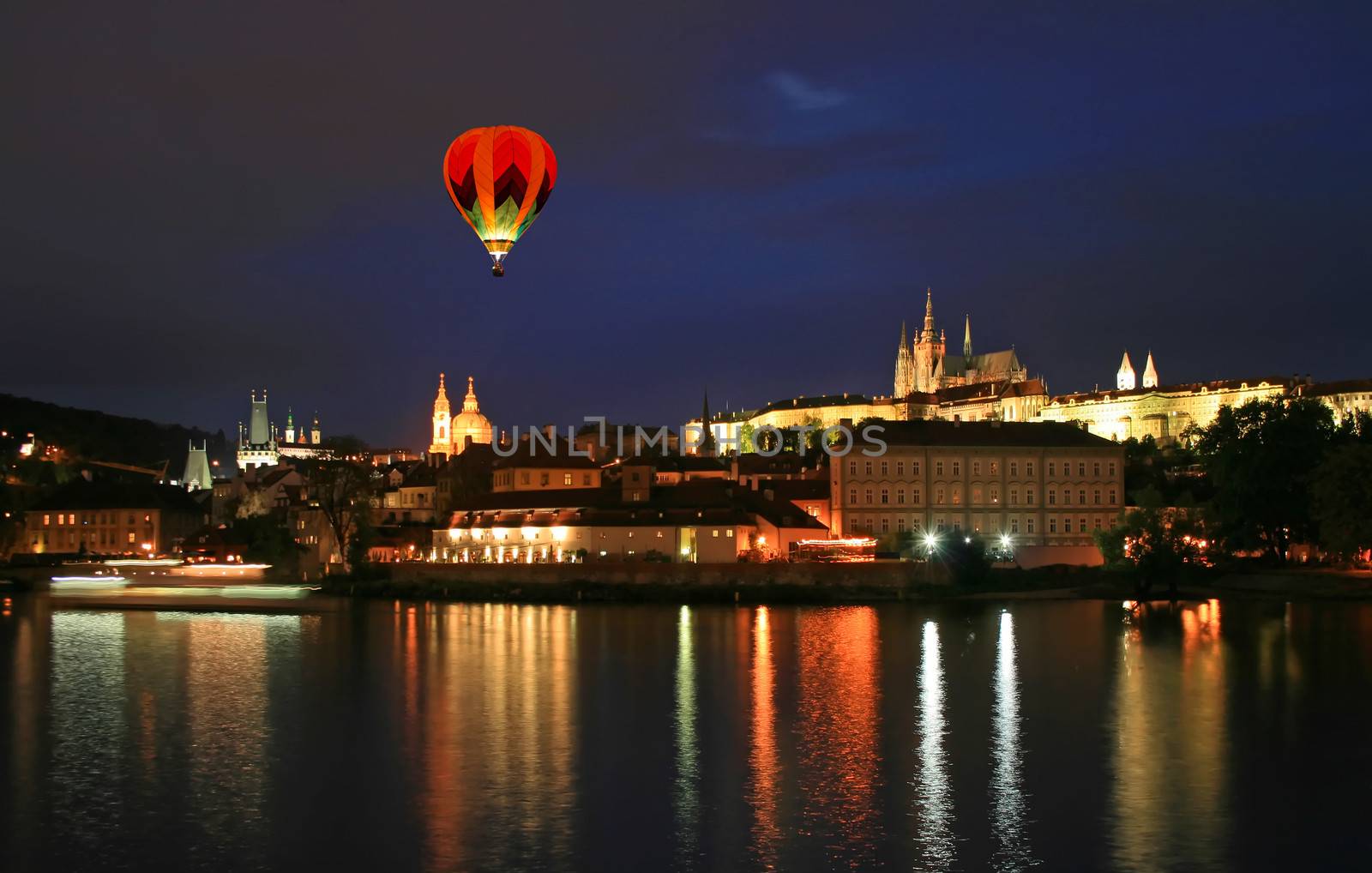 The night view of the beautiful Prague City along the River Vltava