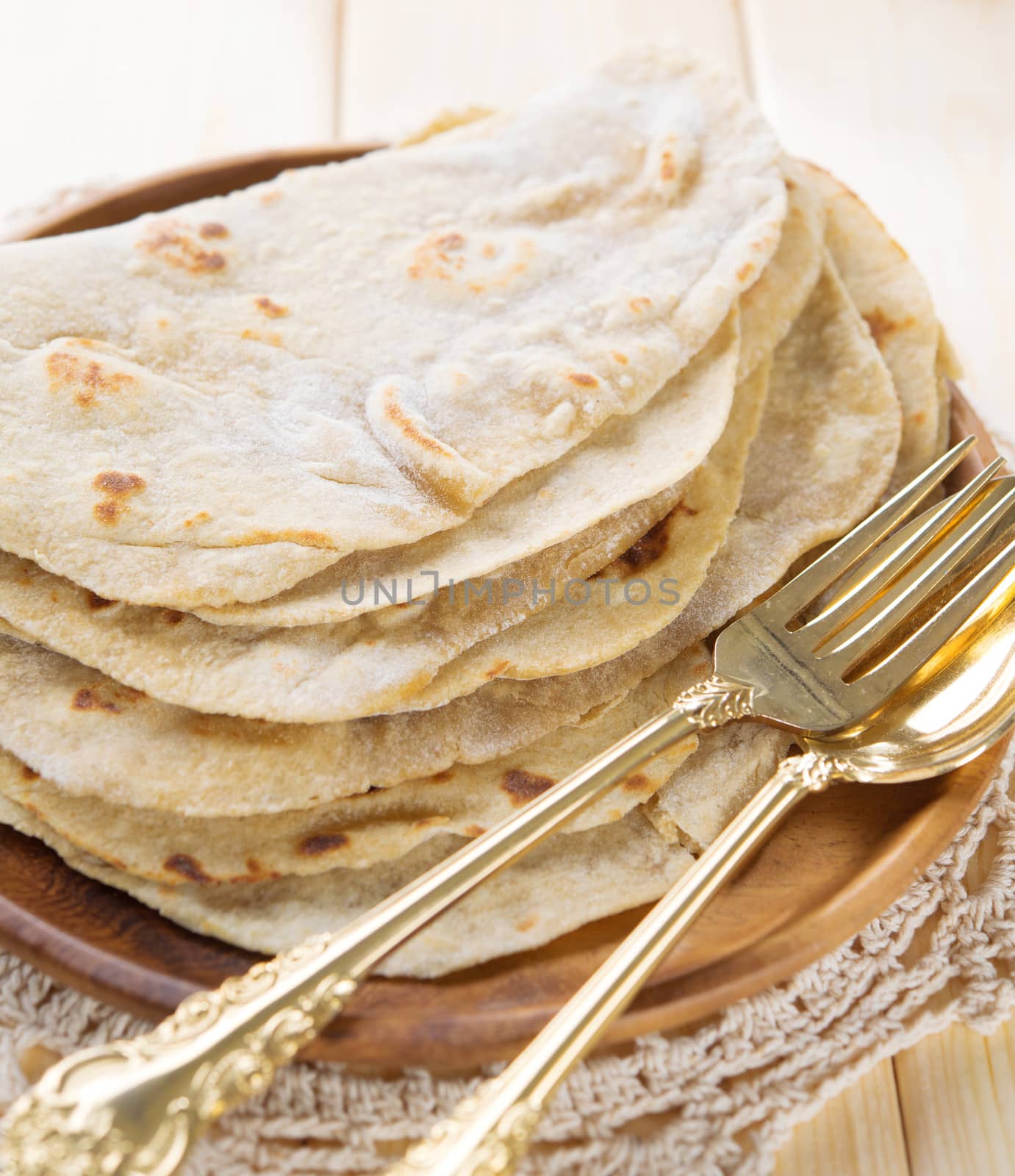 India vegetarian food plain chapatti roti or Flat bread. Indian food on dining table.