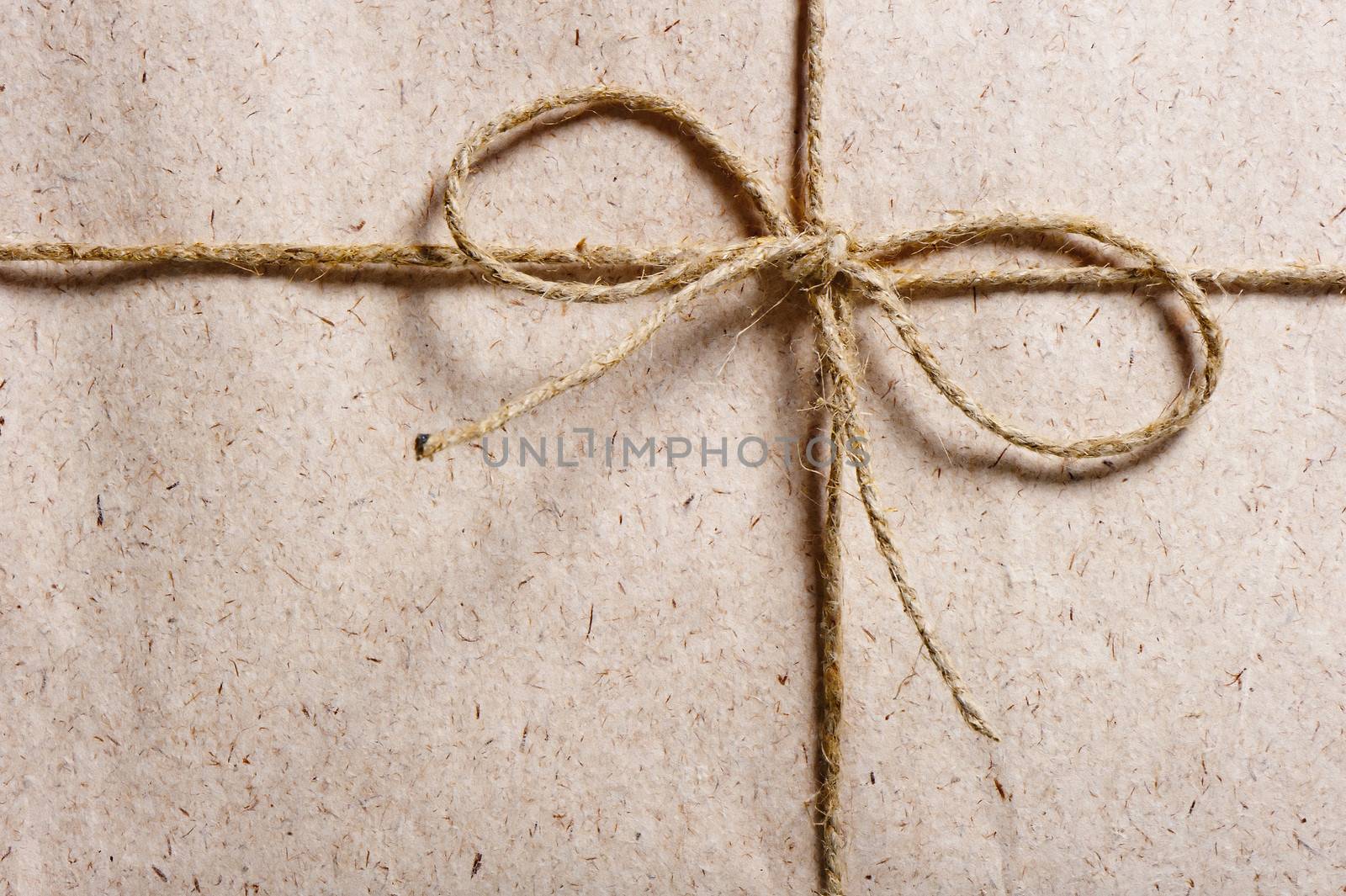 parcel wrapped in brown paper and tied with twine by kosmsos111