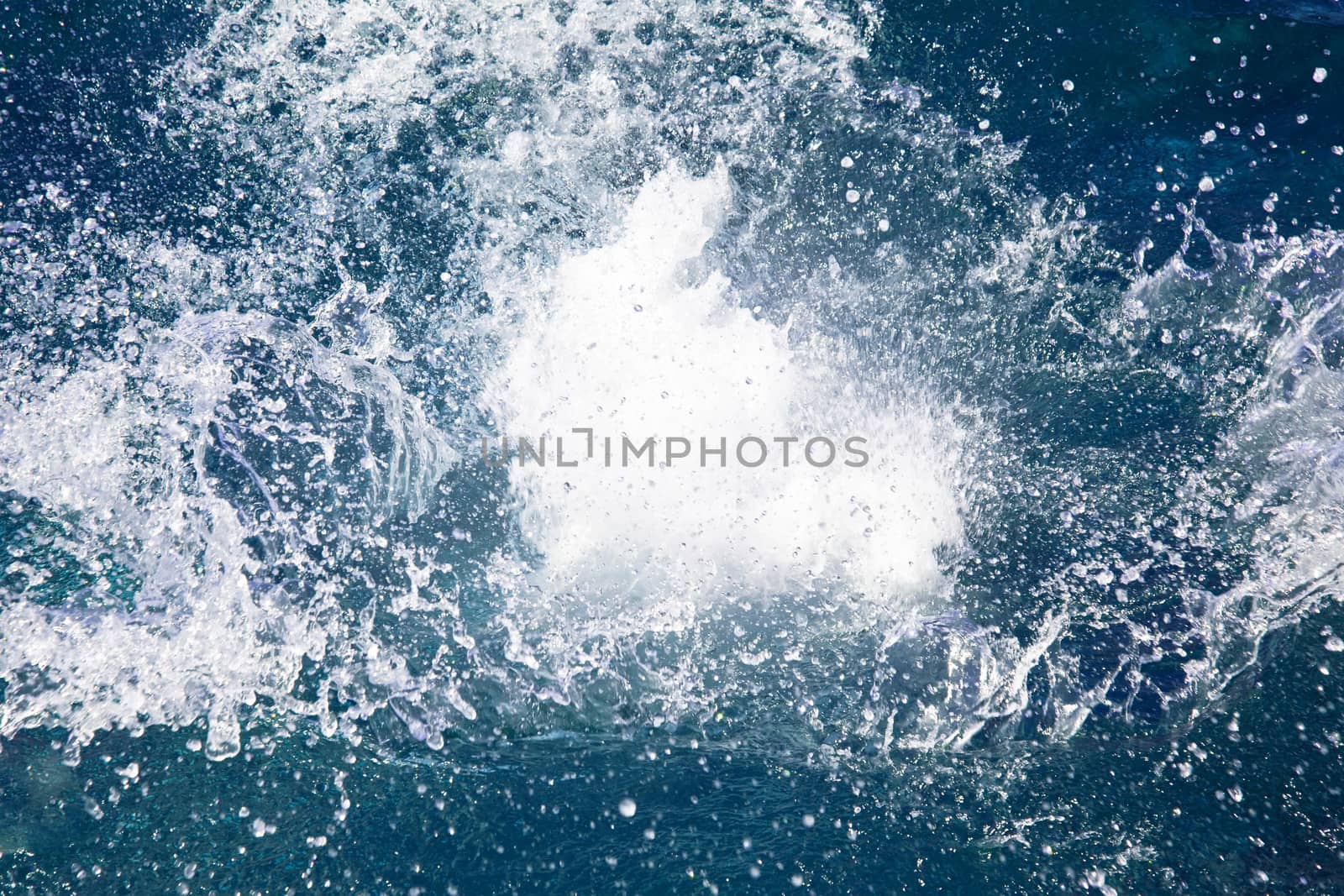 Splash of water on ocean by RawGroup