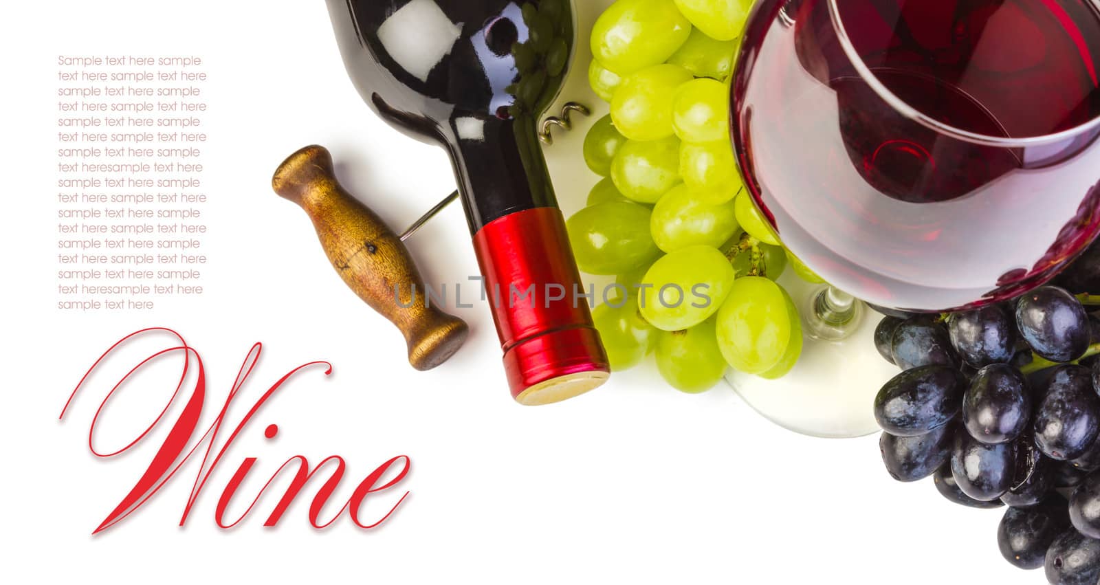 glass of red wine with bottle and grapes on a white background