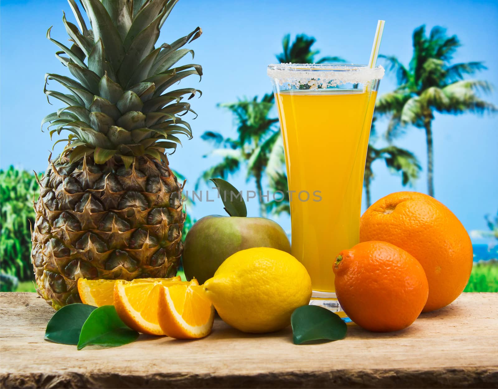 orange juice in a glass on a table with oranges