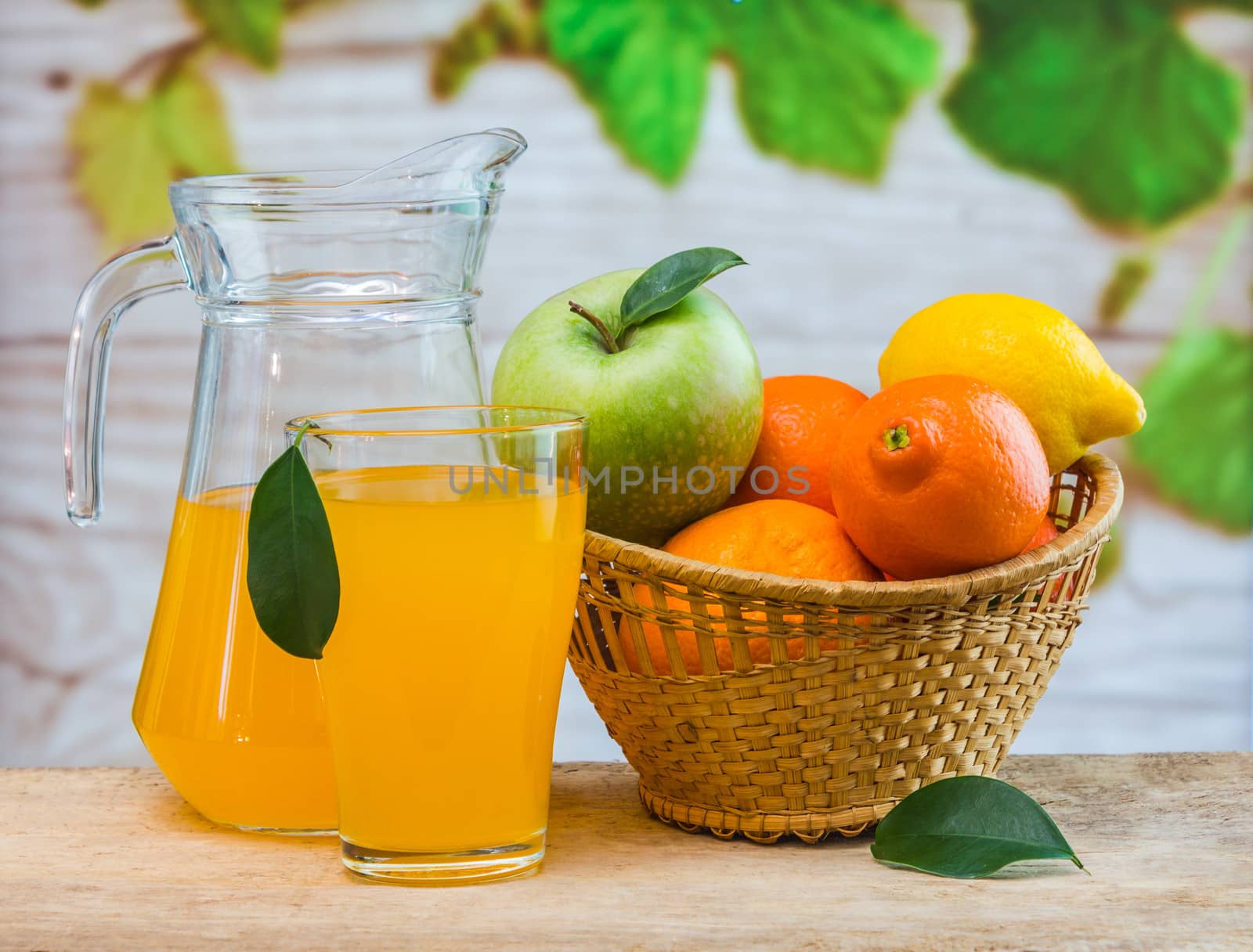 orange juice in a glass on a table by oleg_zhukov