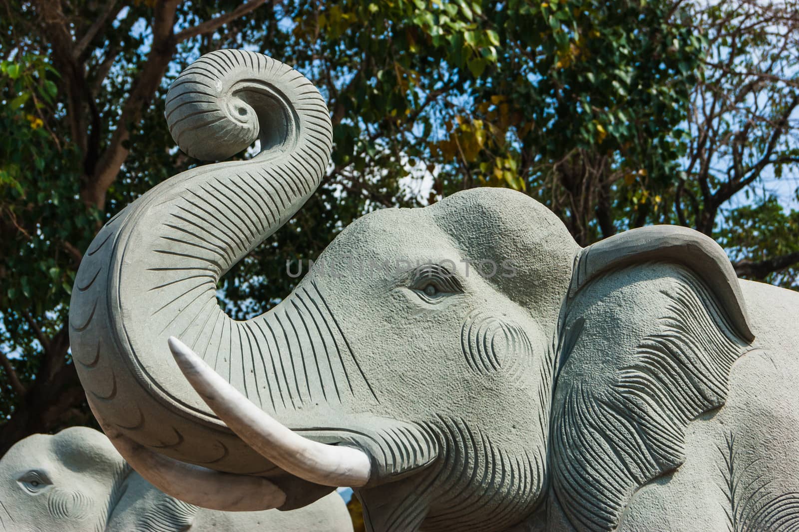 Thai stone elephant on a pedestal on a sunny day by oleg_zhukov