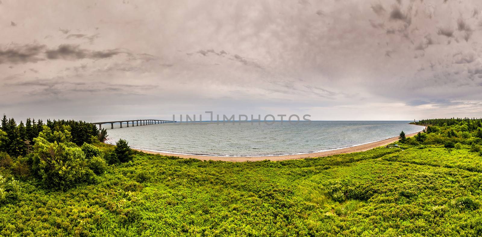 Panoramic view of the Confederation Bridge and the surrounding beach in New Brunswick Canada