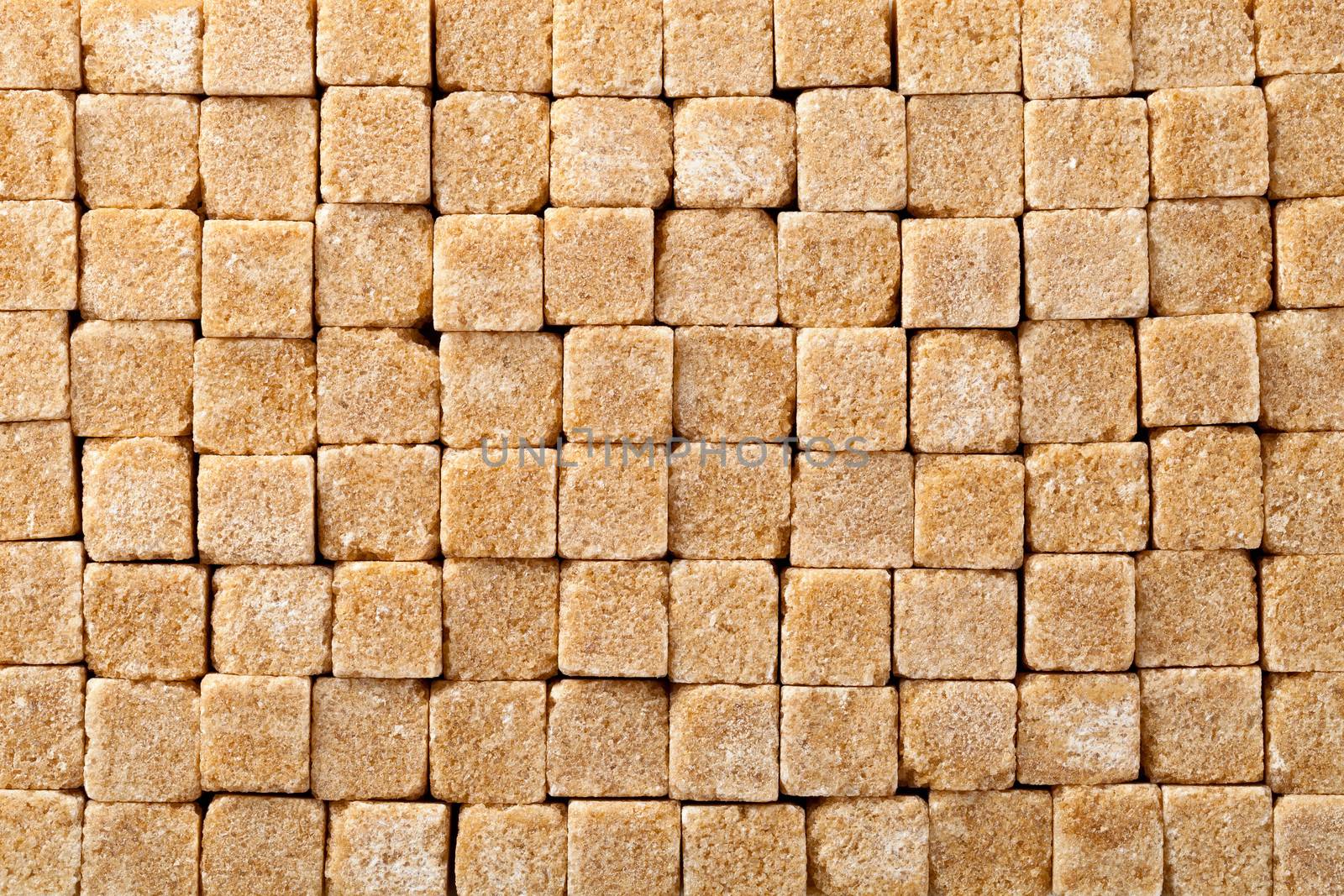 Brown sugar cubes for background. Top view