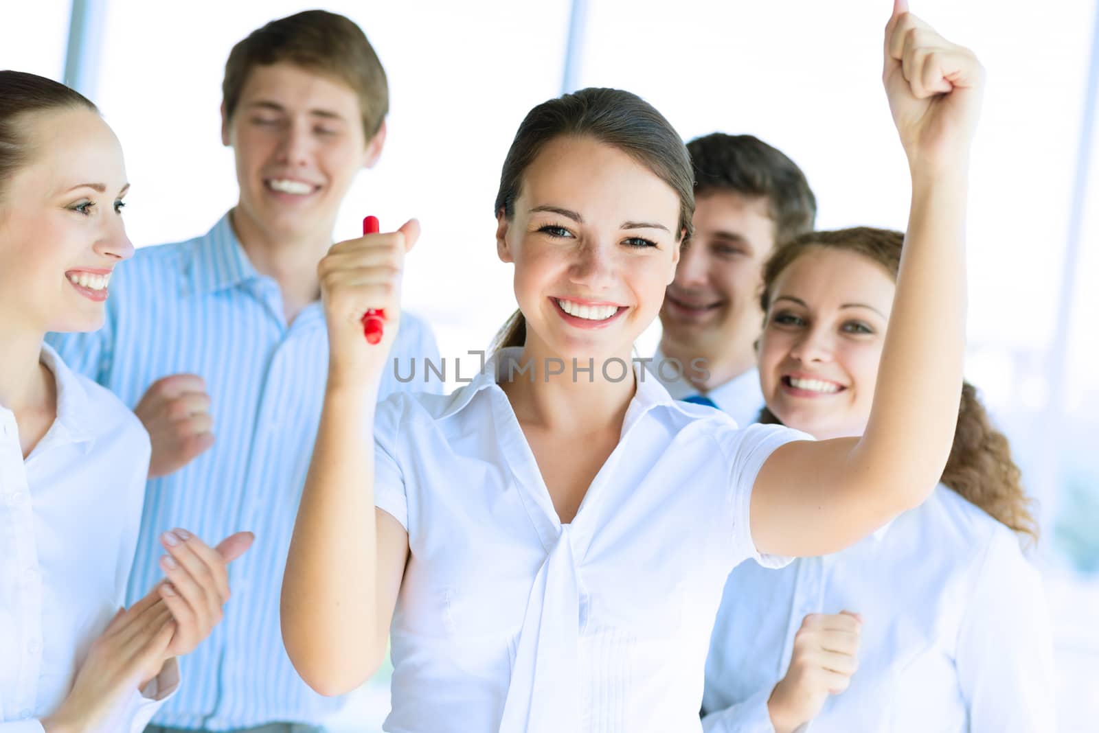 Successful business woman receiving congratulations from his colleagues, business success