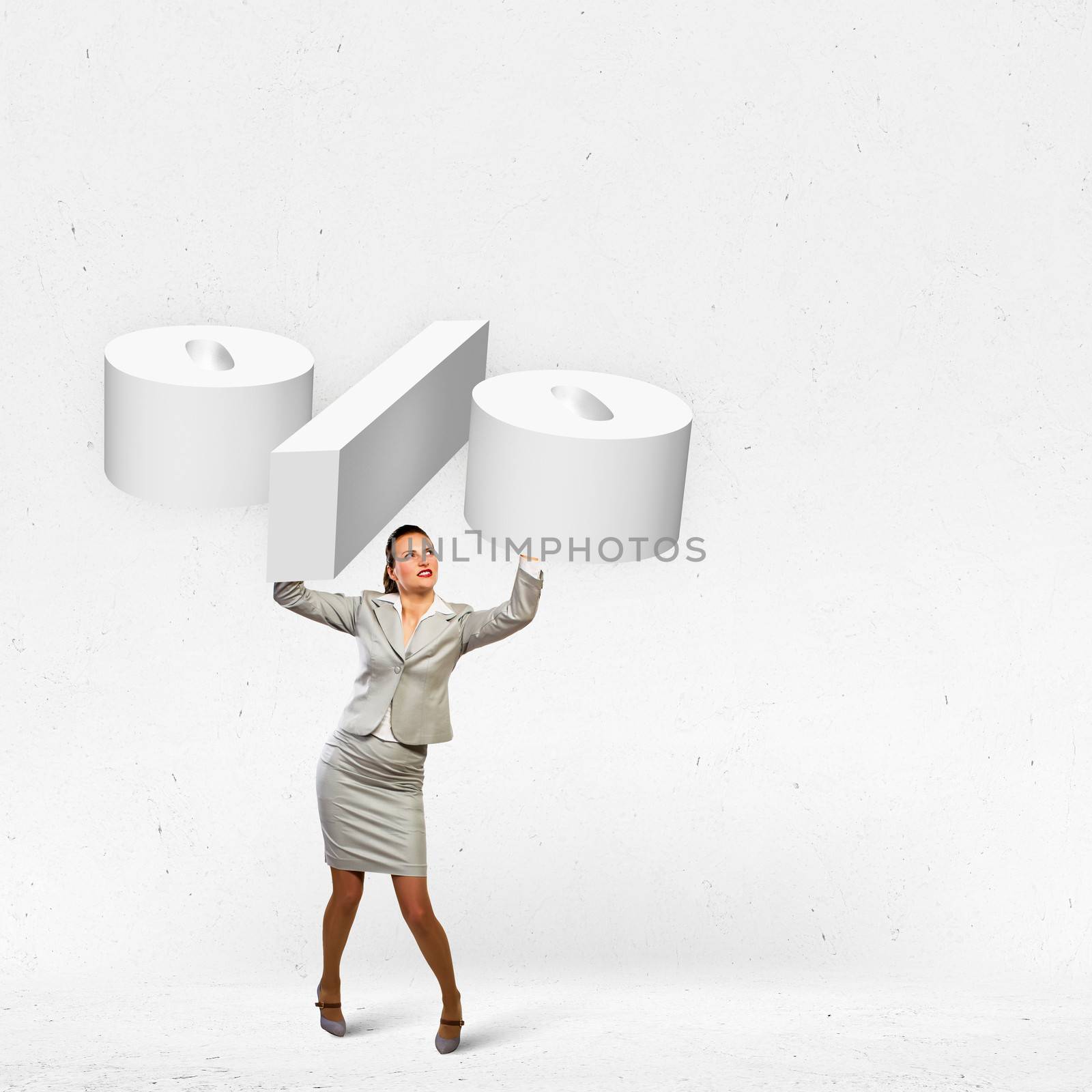 Image of businesswoman holding percentage symbol above head