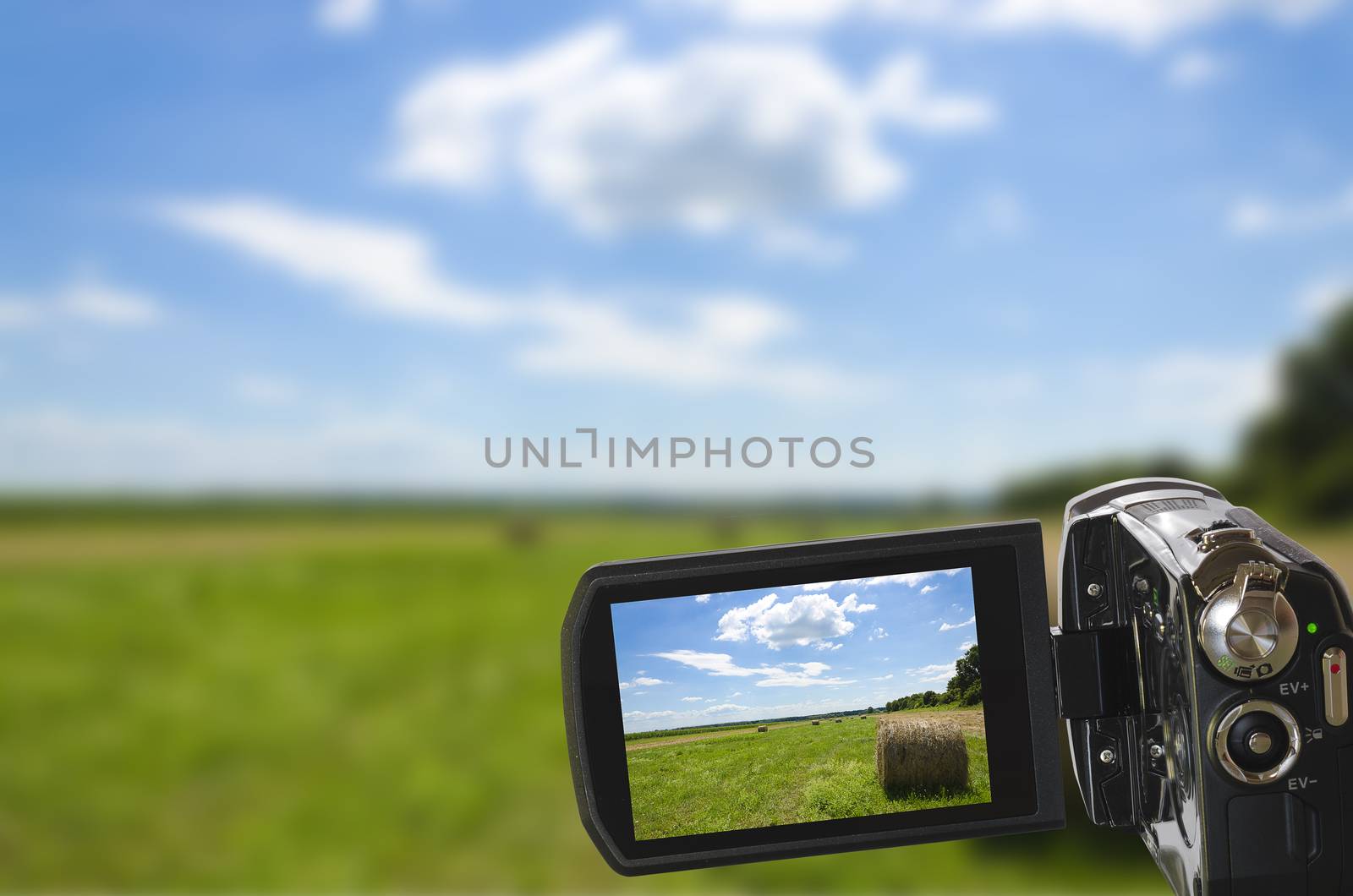 sharp picture of natural landscape seen through digital camcorder and displayed on LCD display