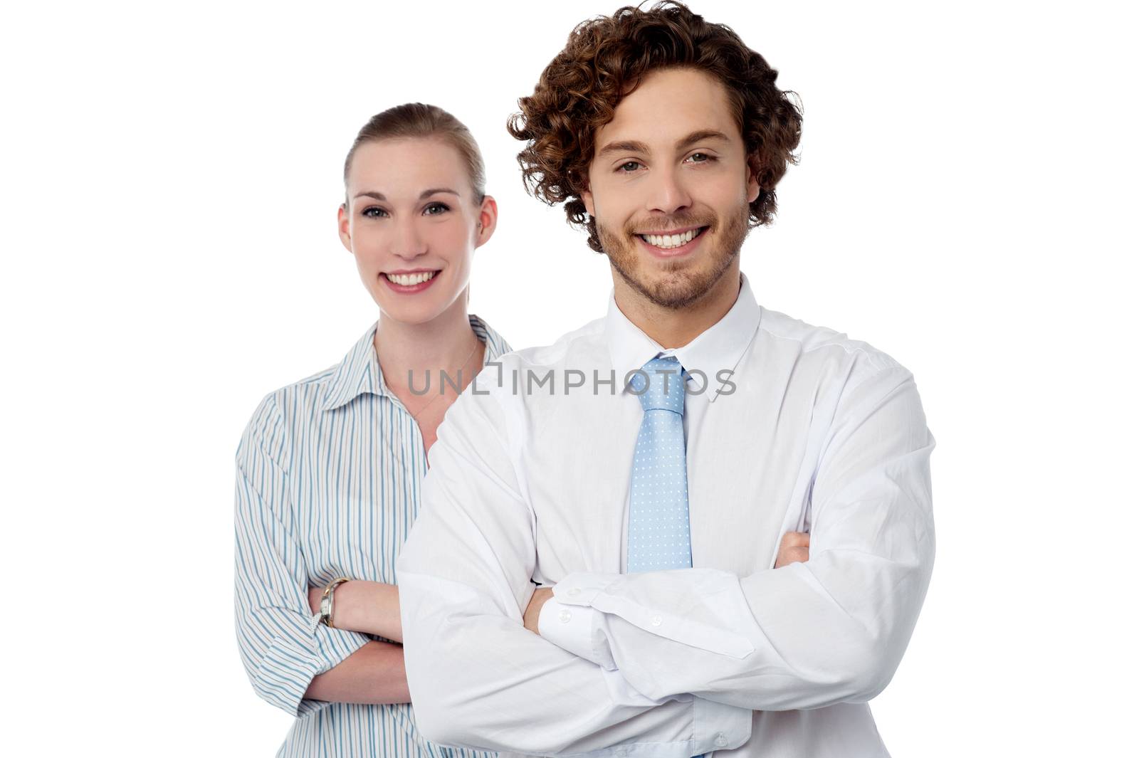 Confident business colleagues posing arms crossed