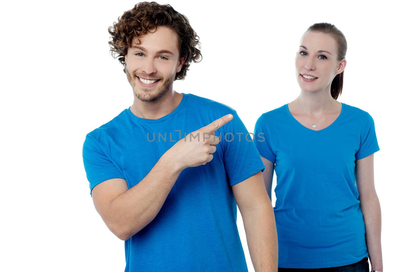 Casual couple over white background by stockyimages