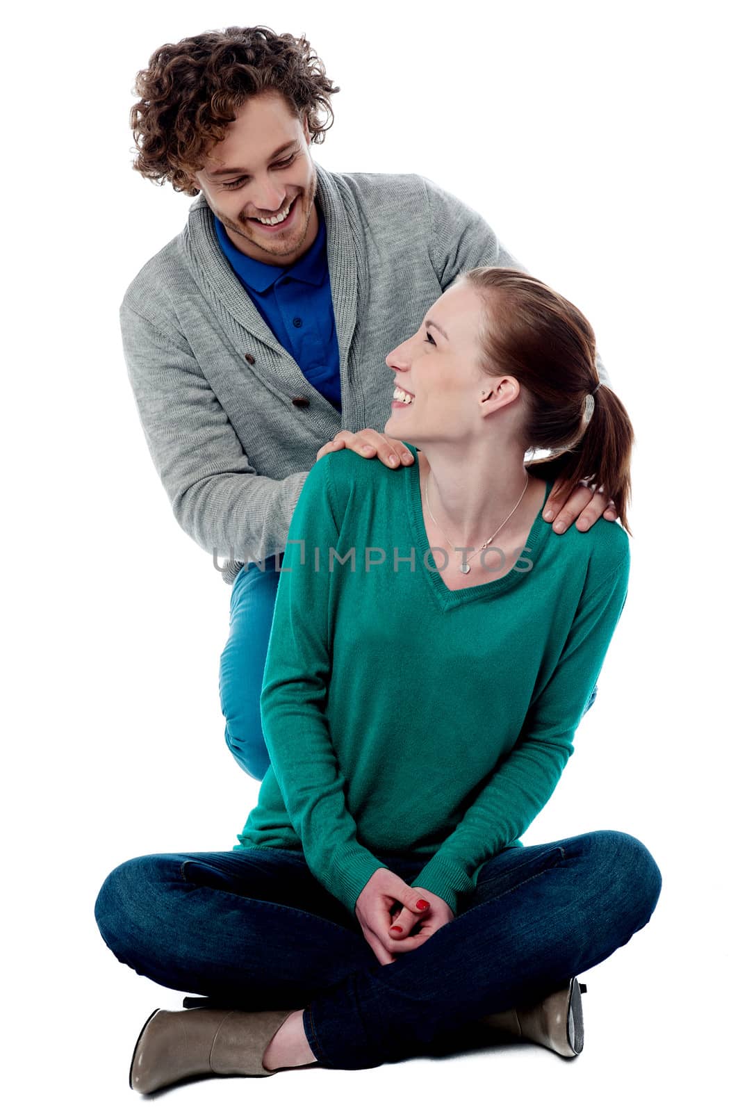 Charming young couple, studio shot by stockyimages