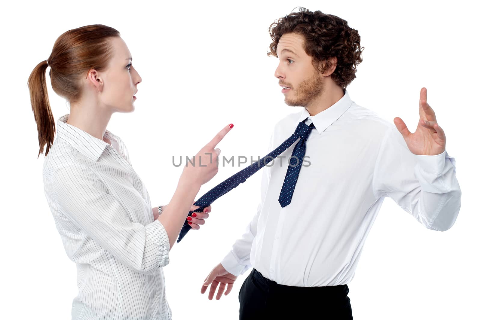 Businesswoman scolding her colleague by stockyimages