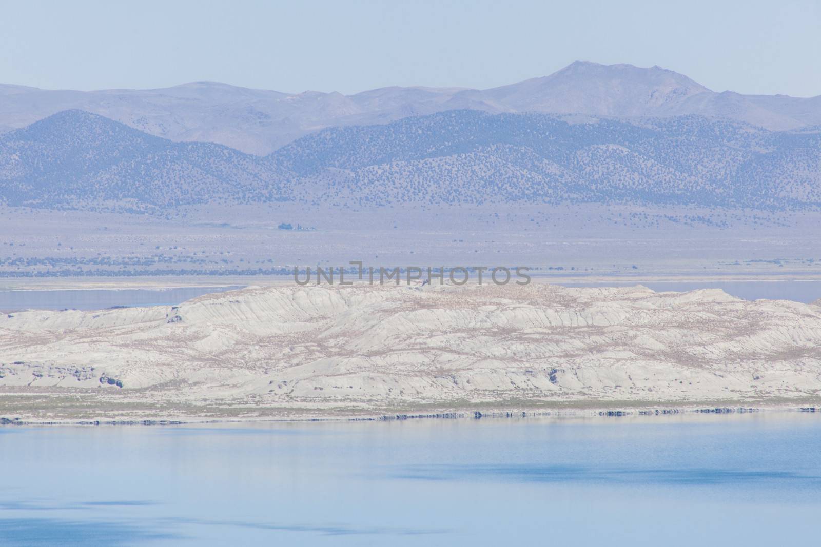 Mono Lake is a large, shallow saline lake in Mono County, California, The lack of an outlet causes high levels of salts to accumulate in the lake.