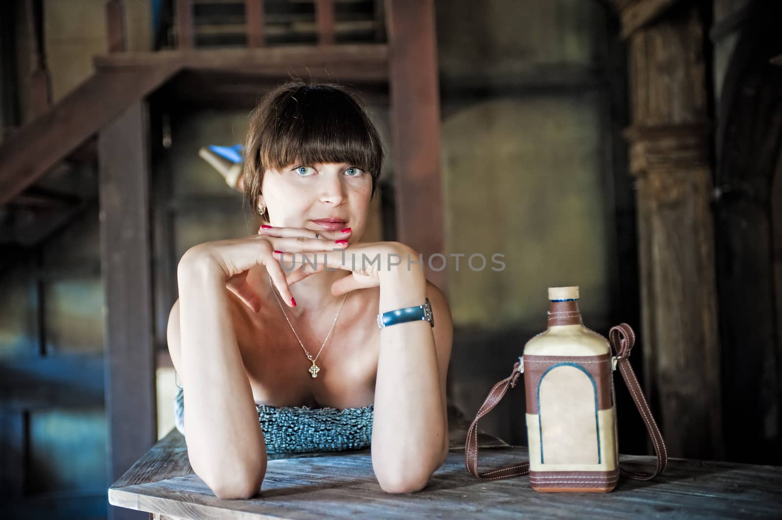 Portrait of brunette girl, who leaned on the table by kosmsos111