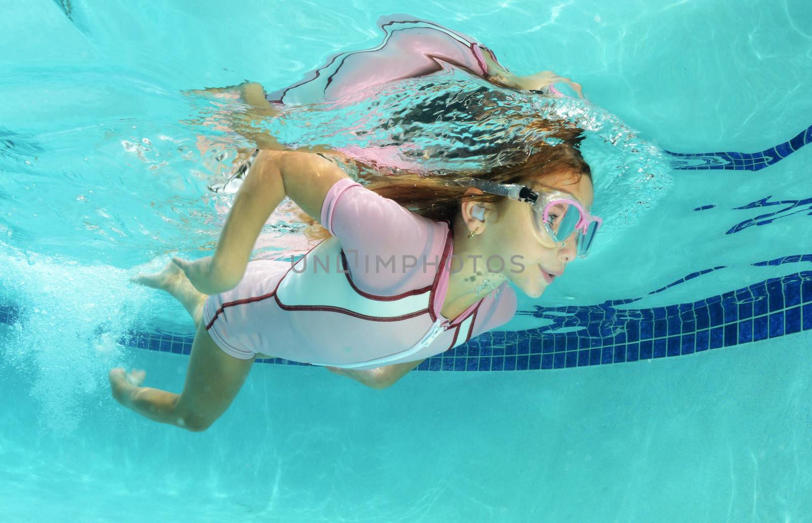 cute kid swimming in pool by ftlaudgirl