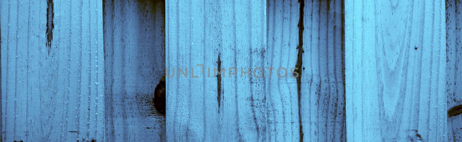 a natural wood banner background in a blue hue