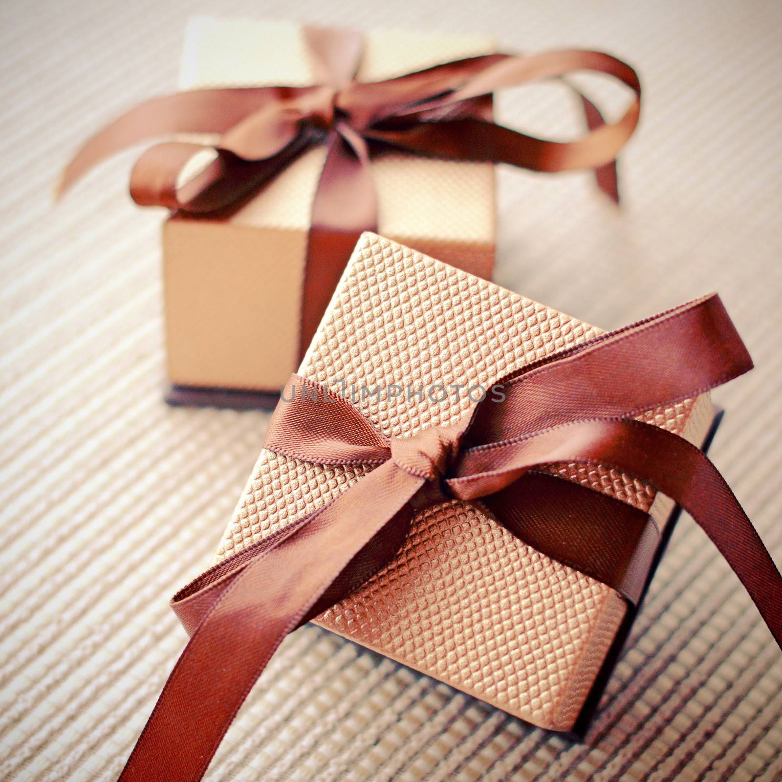 Luxury gift boxes with ribbon, retro filter effect  by nuchylee