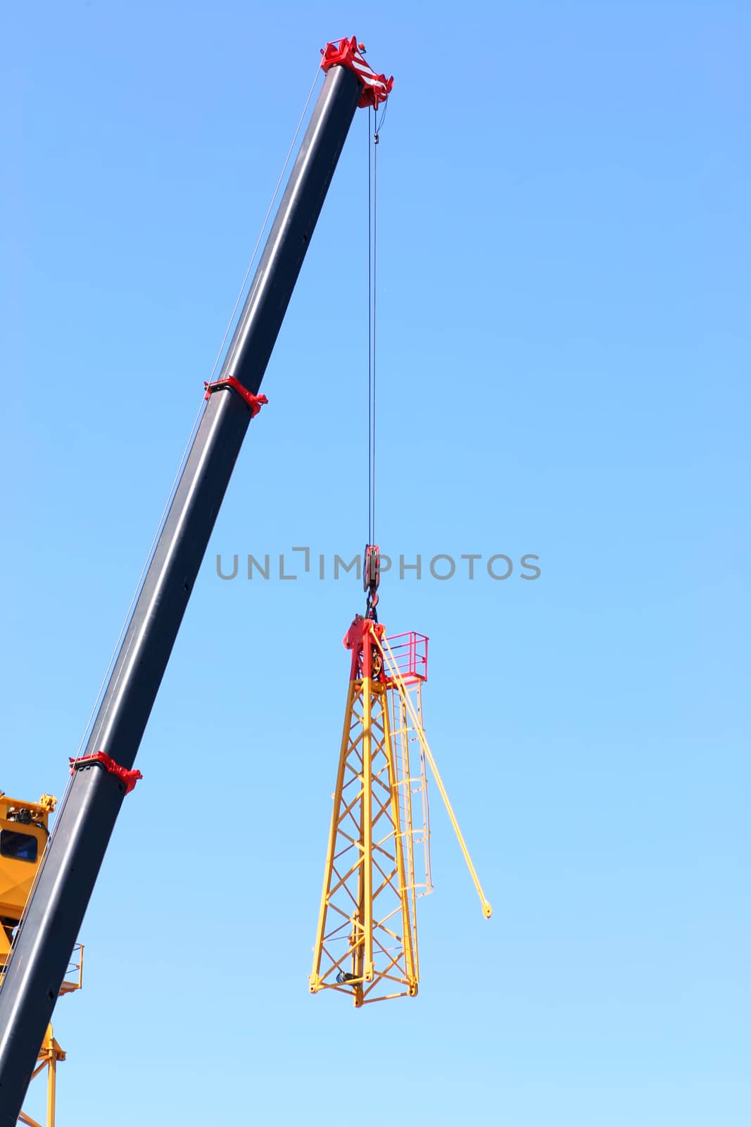 Crane lifting pieces of equipment